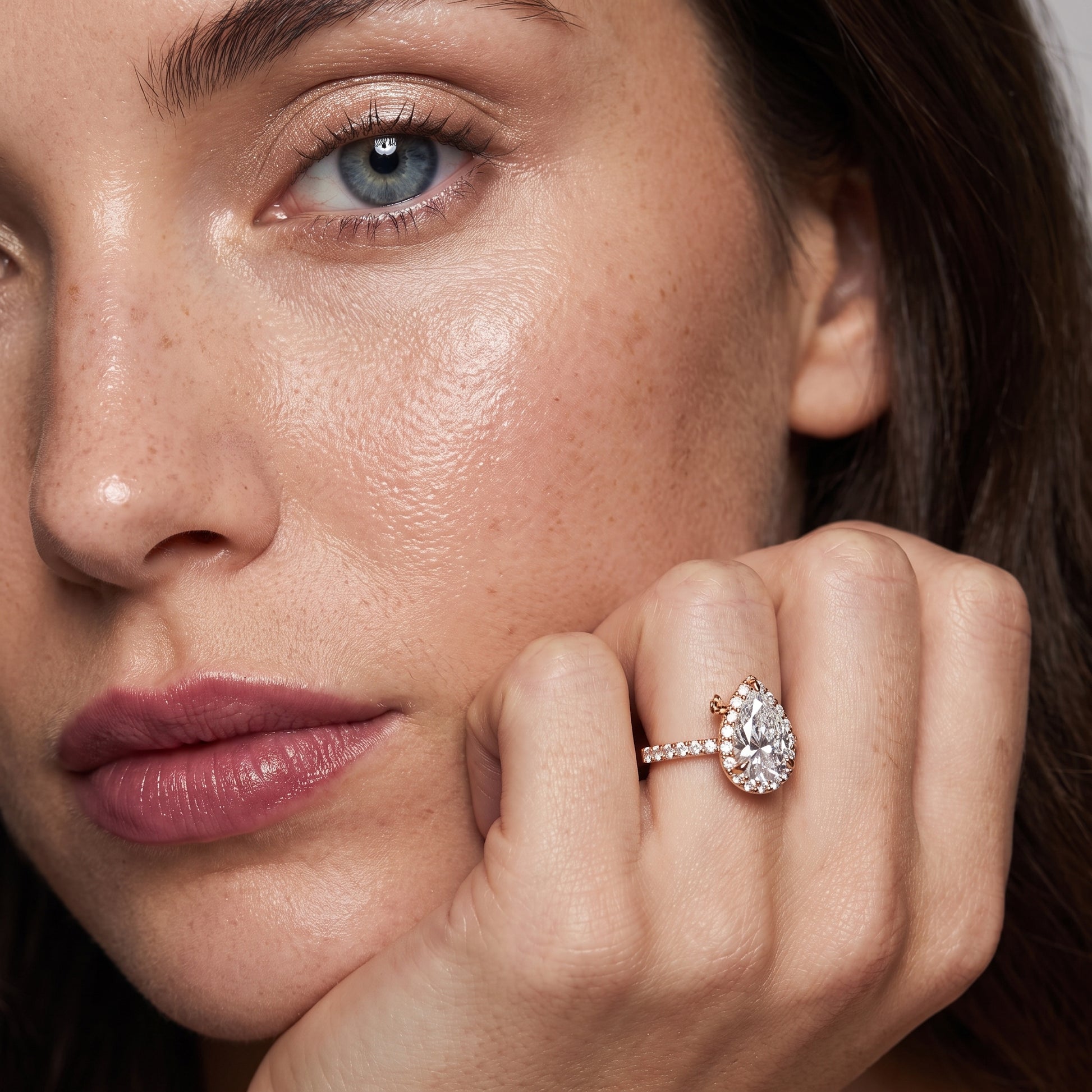 Amara Halo Claw Prong Pear Diamond Ring in Rose Gold - model.jpg