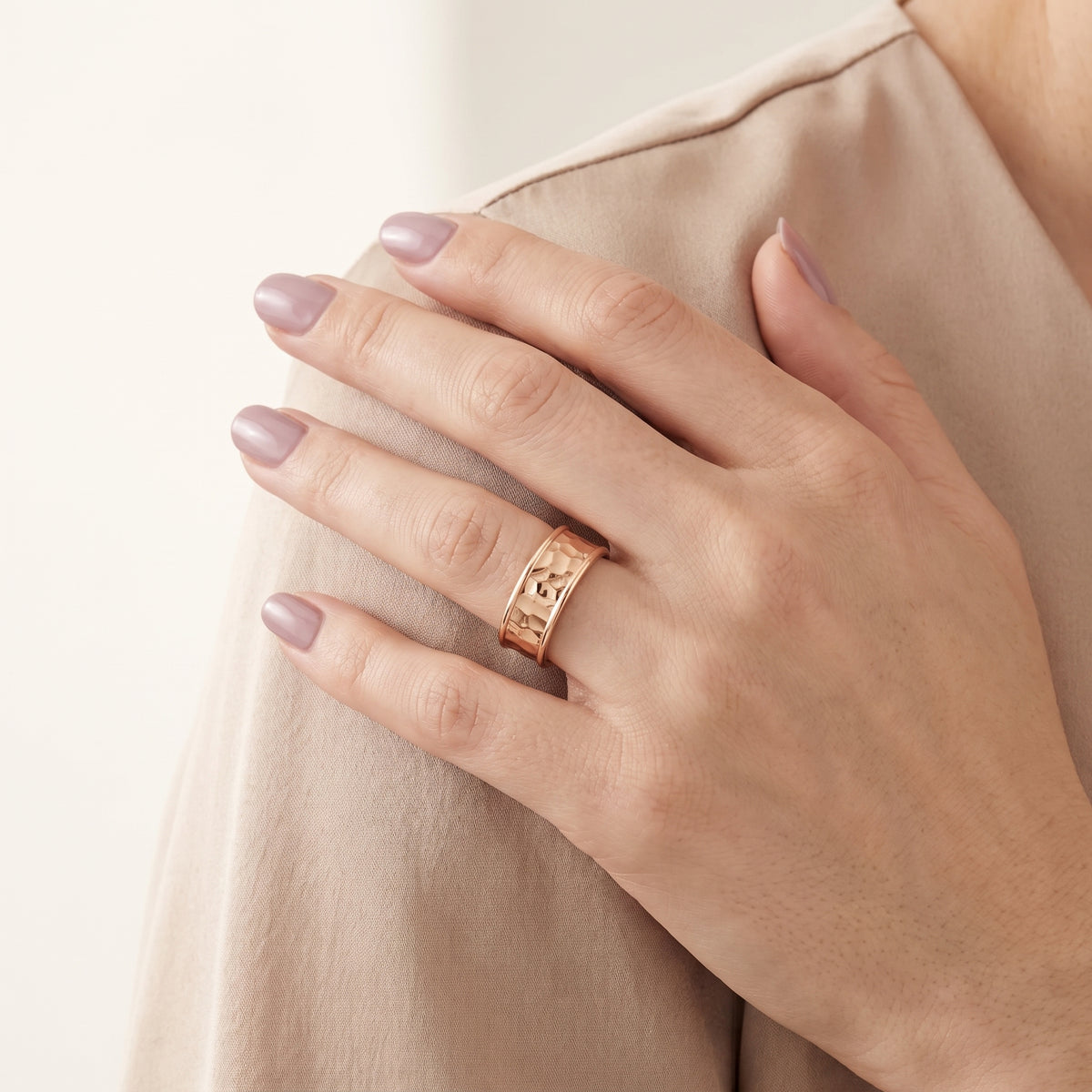 Paige Hammered Step Edge Wedding Band in Rose Gold - model.jpg