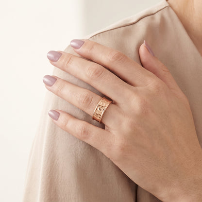 Paige Hammered Step Edge Wedding Band in Rose Gold - model.jpg