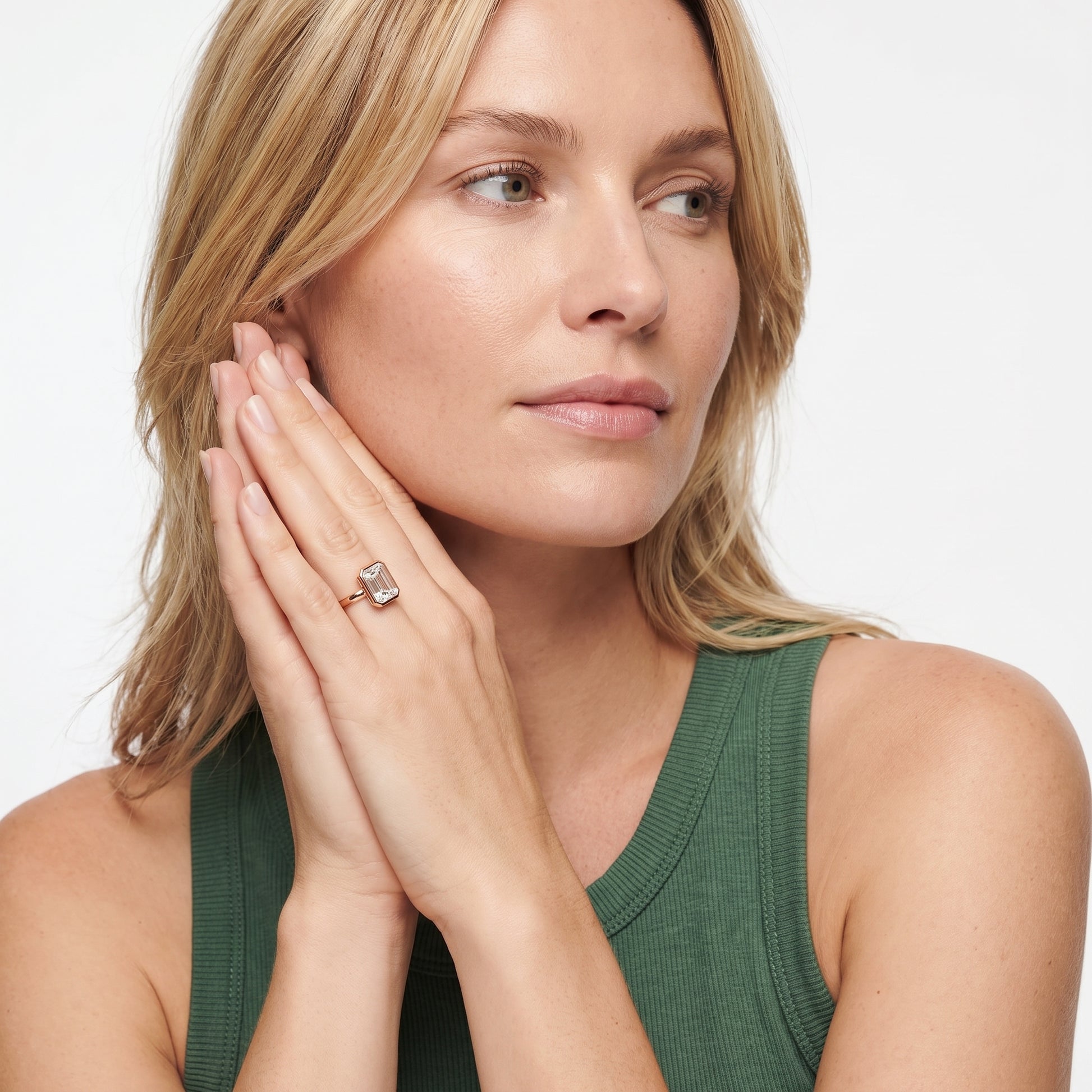 Maeve Bezel Solitaire Emerald Diamond Ring in Rose Gold - model.jpg