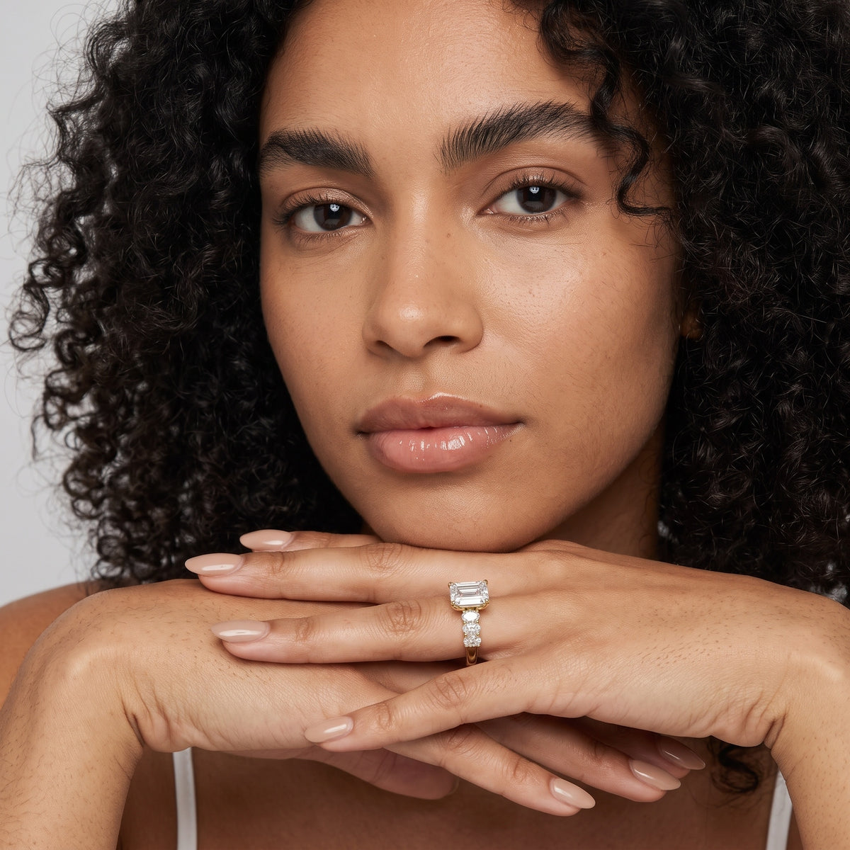 Kiera Graduated Seven-Stone Emerald Diamond Engagement Ring in White Gold - model.jpg