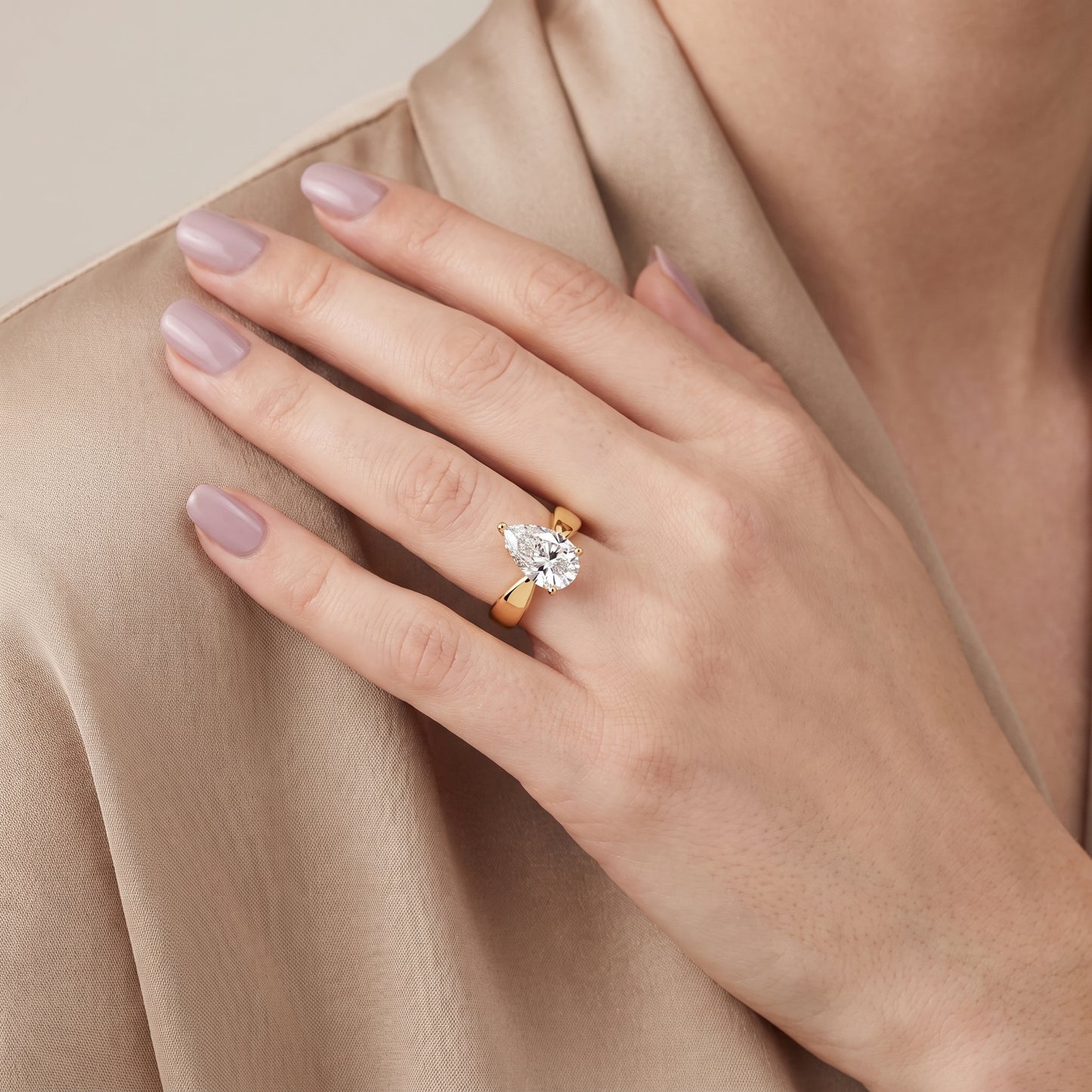 Talia Solitaire Twist Pear Diamond Engagement Ring in Yellow Gold - model.jpg