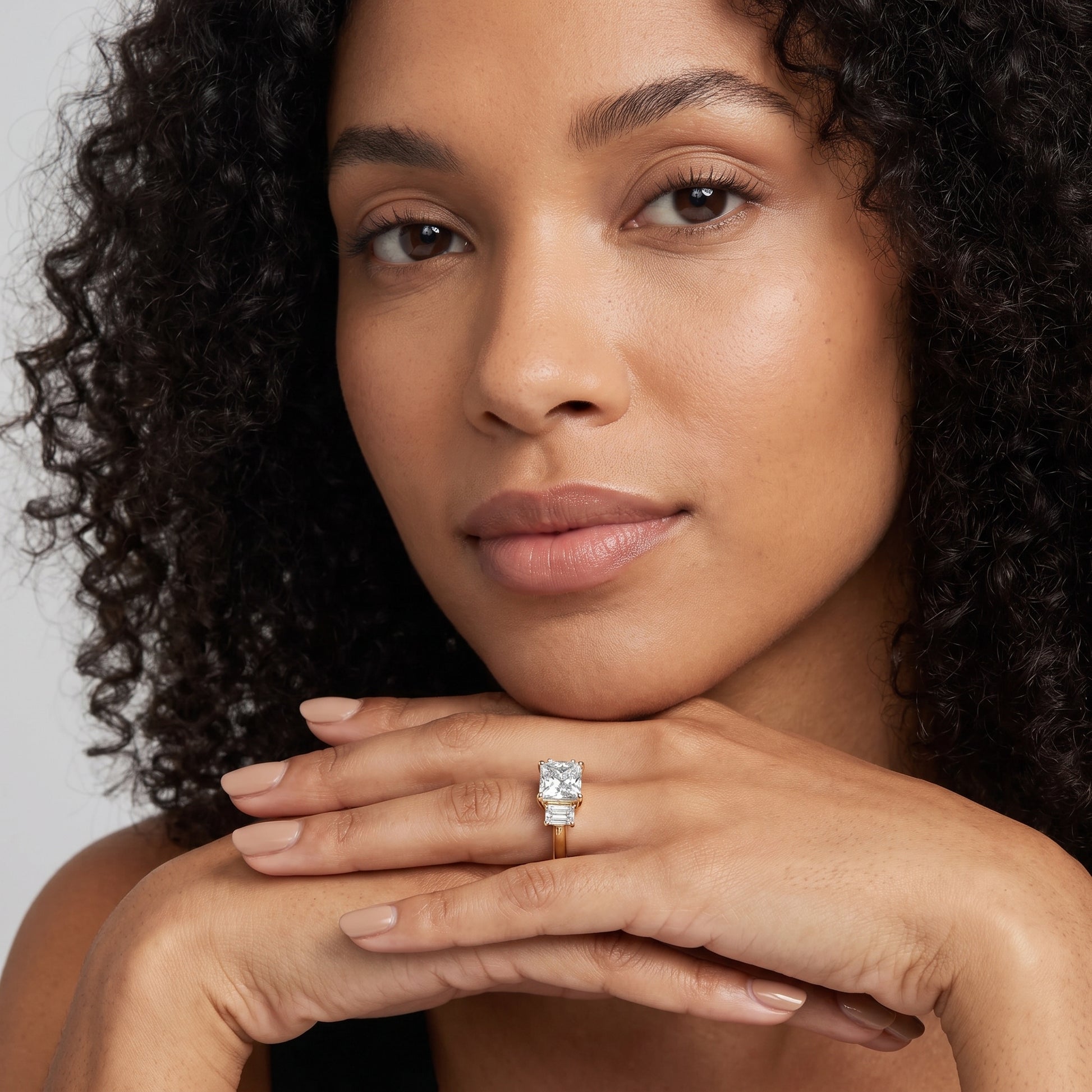 Zoe Three-Stone Princess Diamond Ring in Yellow Gold - model.jpg