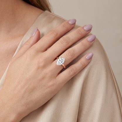 Delia Solitaire Oval Diamond Engagement Ring in Rose Gold - model.jpg