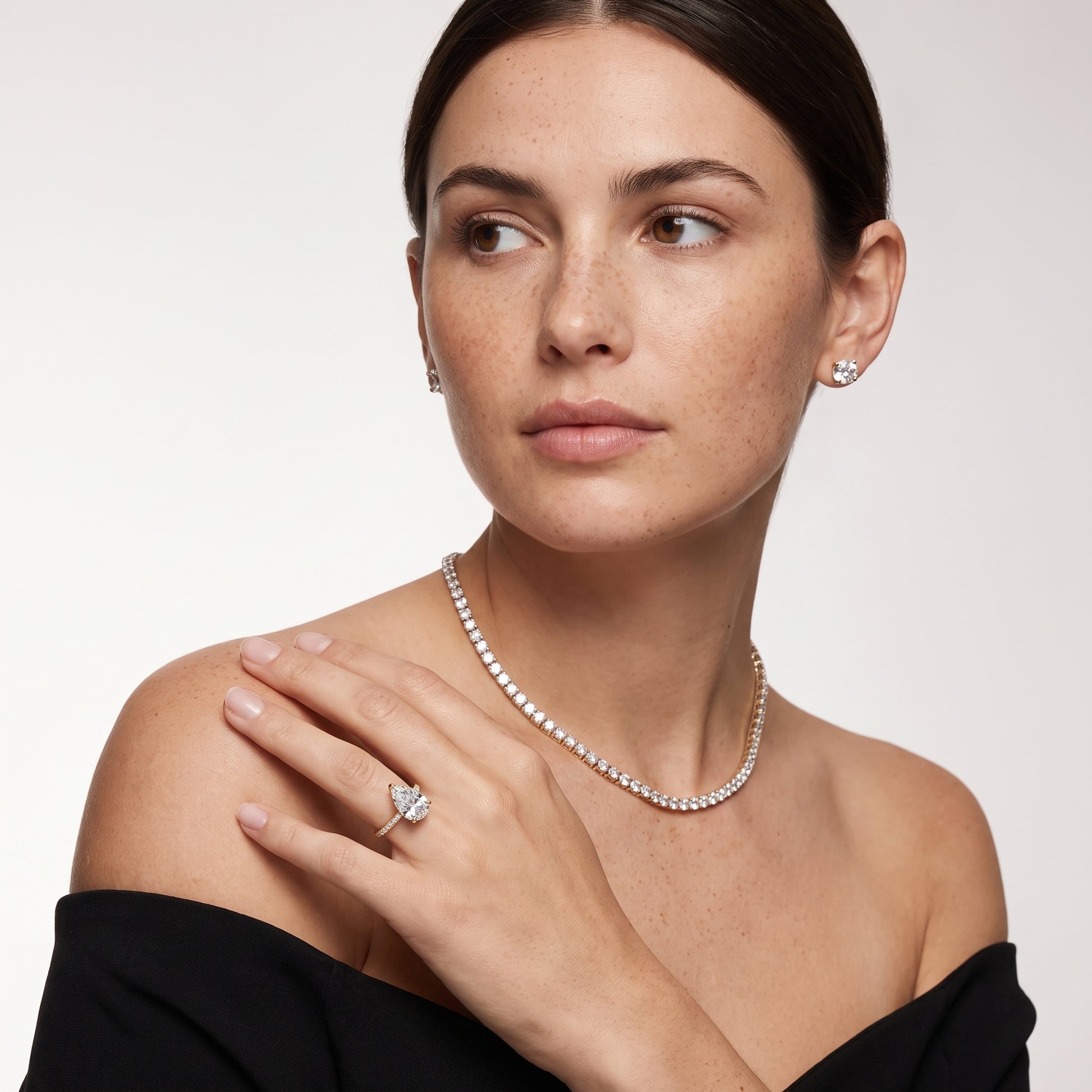 Naia Hidden Halo Pear Diamond Ring in Yellow Gold - model.jpg