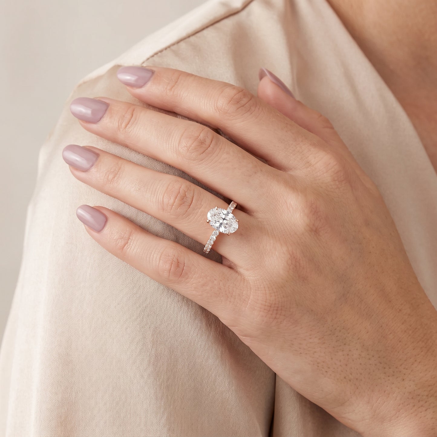 Novara Solitaire Pavé Oval Diamond Ring in Rose Gold - model.jpg