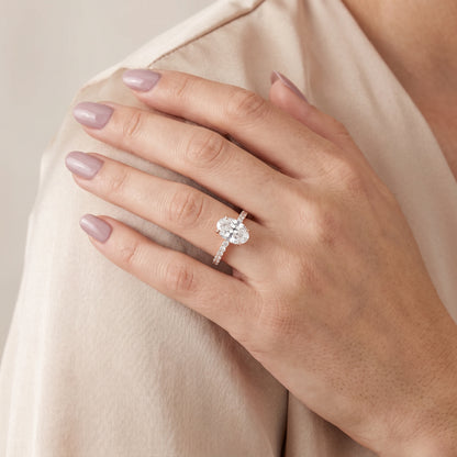 Novara Solitaire Pavé Oval Diamond Ring in Rose Gold - model.jpg