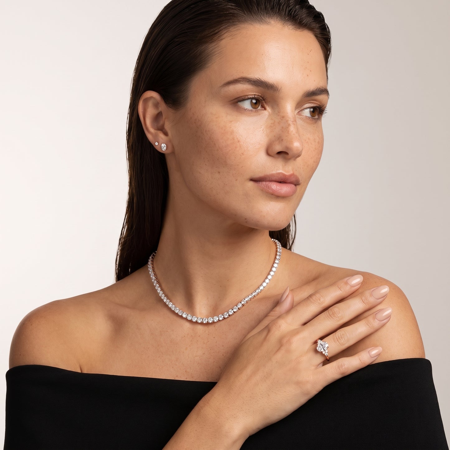Anya Sidestone Cluster Oval Diamond Ring in Rose Gold - model.jpg