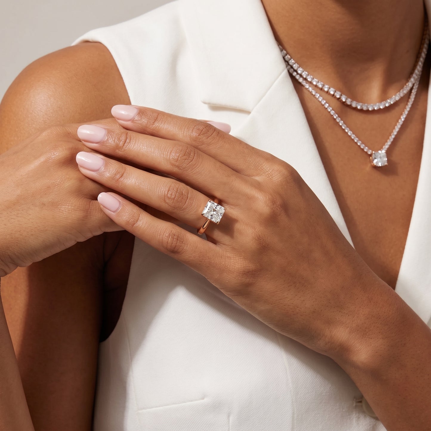 Kalia Knife Edge Solitaire Radiant Diamond Engagement Ring in Rose Gold - model.jpg