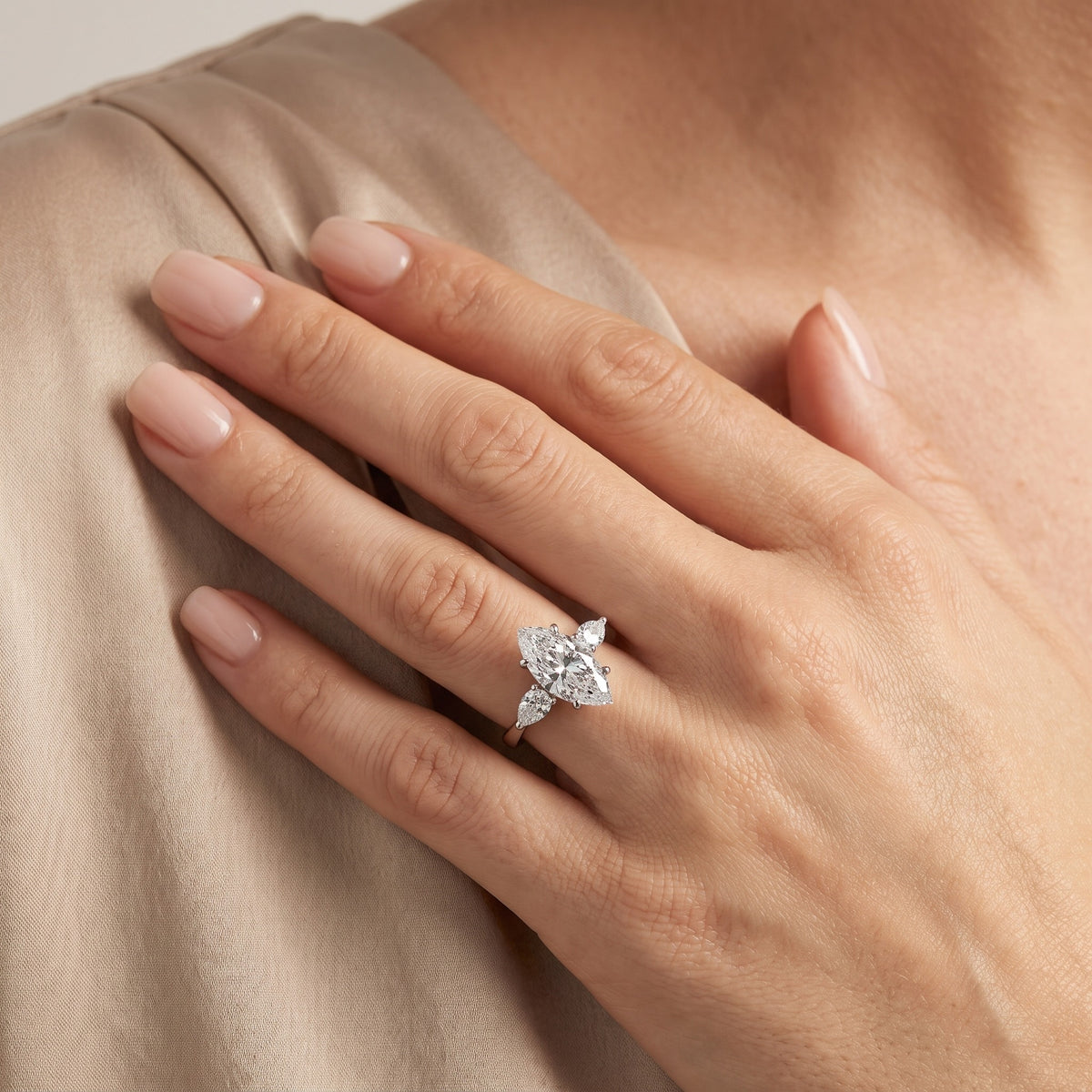 Grace Three Stone Marquise Diamond Engagement Ring in Silver - model.jpg