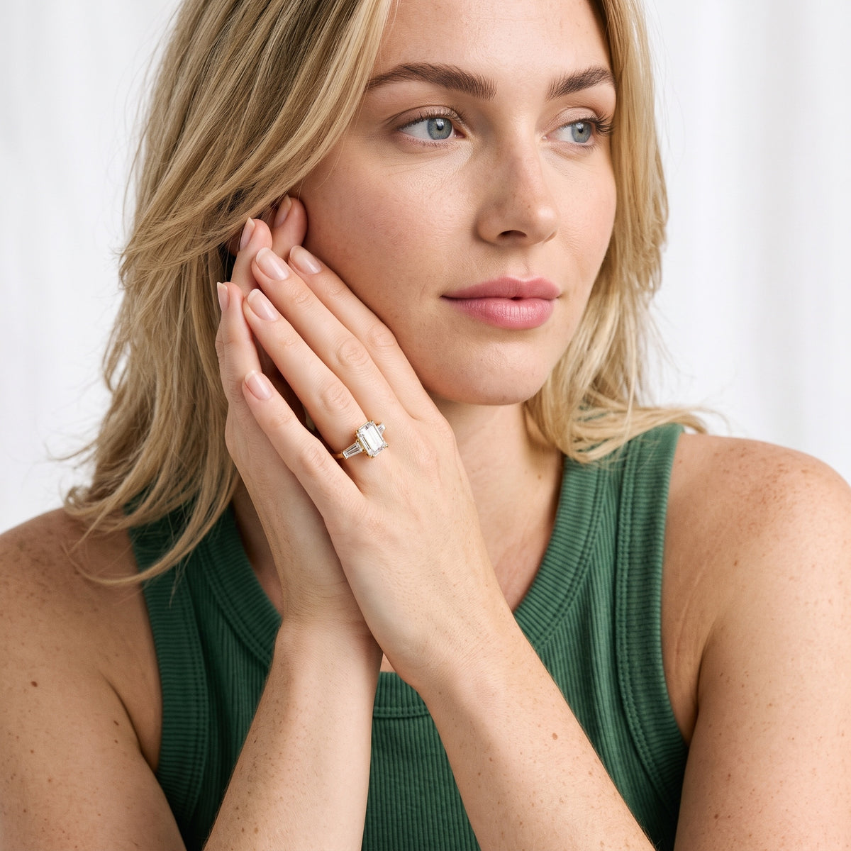 Davina Baguette Three-Stone Emerald Diamond Engagement Ring in Yellow Gold - model.jpg