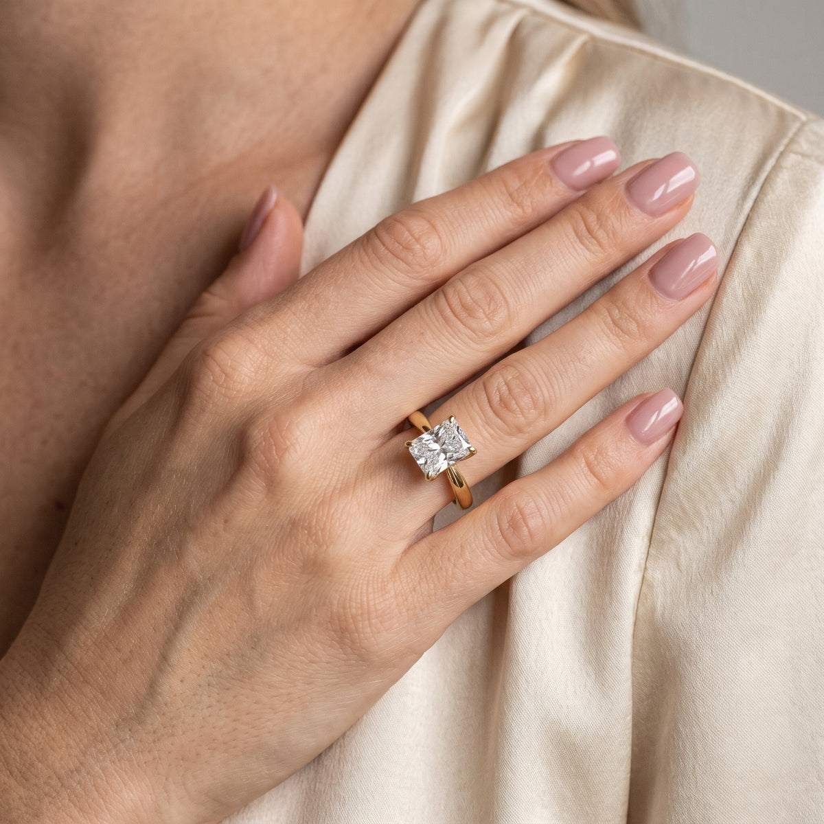 Lucia Solitaire Six-Prong Radiant Diamond Engagement Ring in Yellow Gold - model.jpg