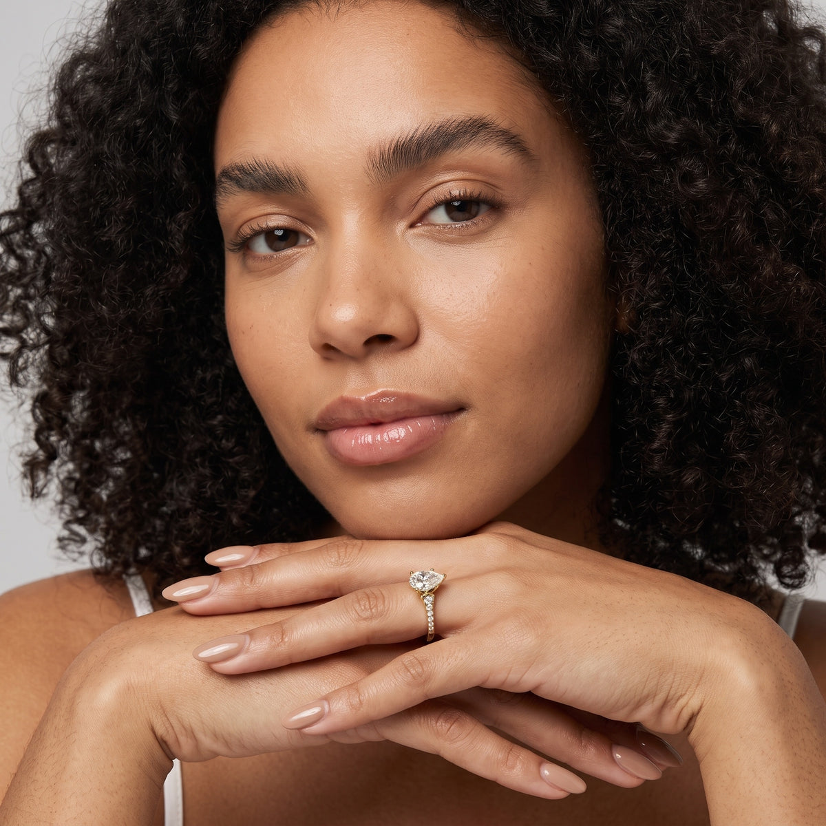 Calista Graduated Pavé Pear Diamond Engagement Ring in Yellow Gold - model.jpg
