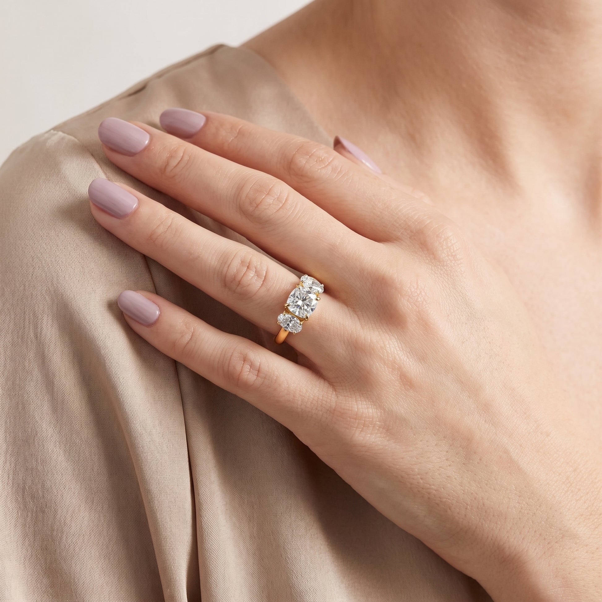 Lila Three-Stone Cushion Diamond Ring in Yellow Gold - model.jpg