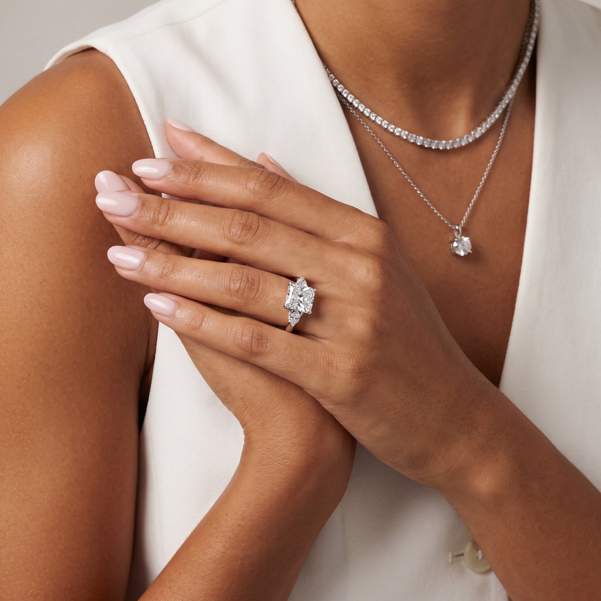 Leila Three-Stone Radiant Diamond Engagement Ring in White Gold - model.jpg