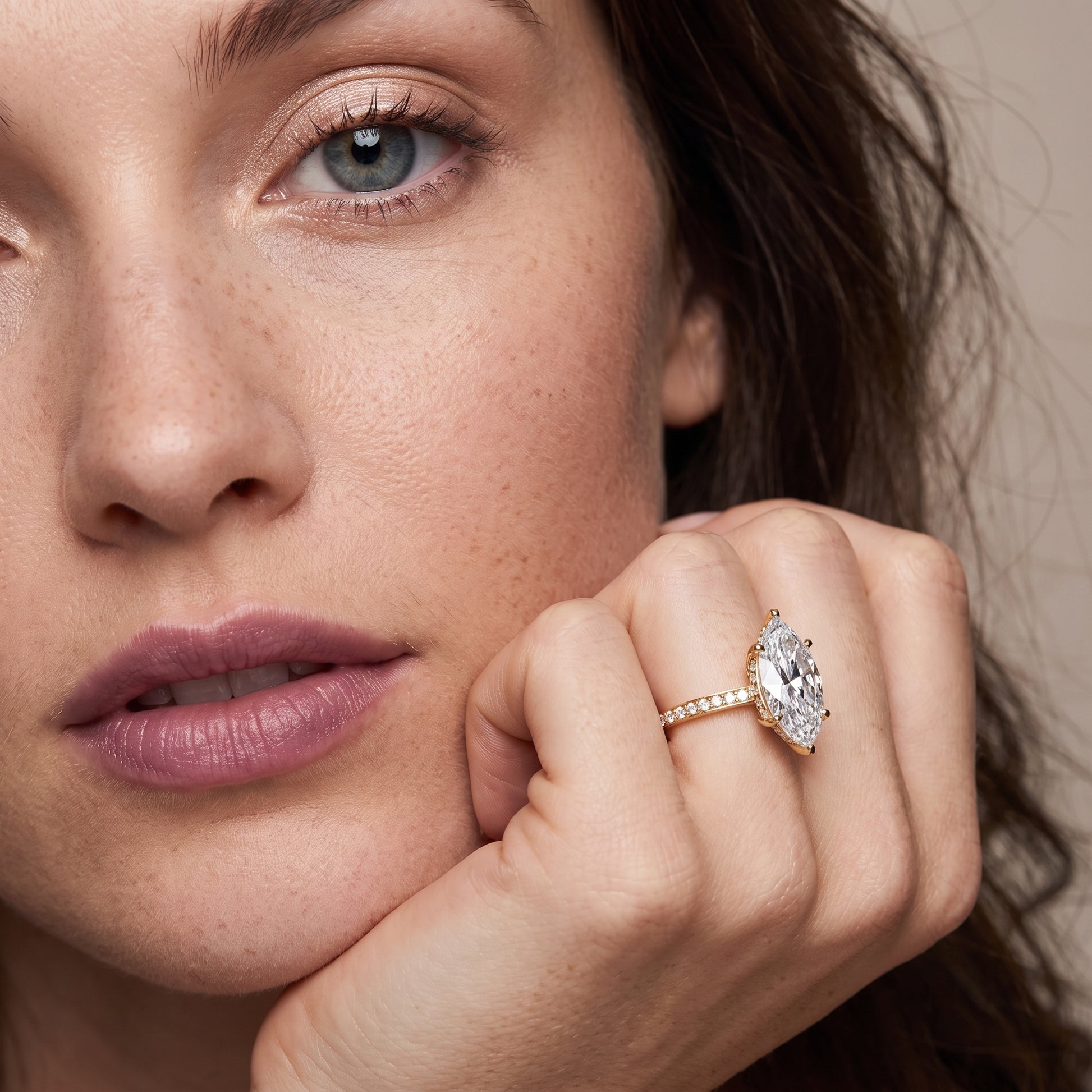 Naia Hidden Halo Marquise Diamond Ring in Yellow Gold - model.jpg
