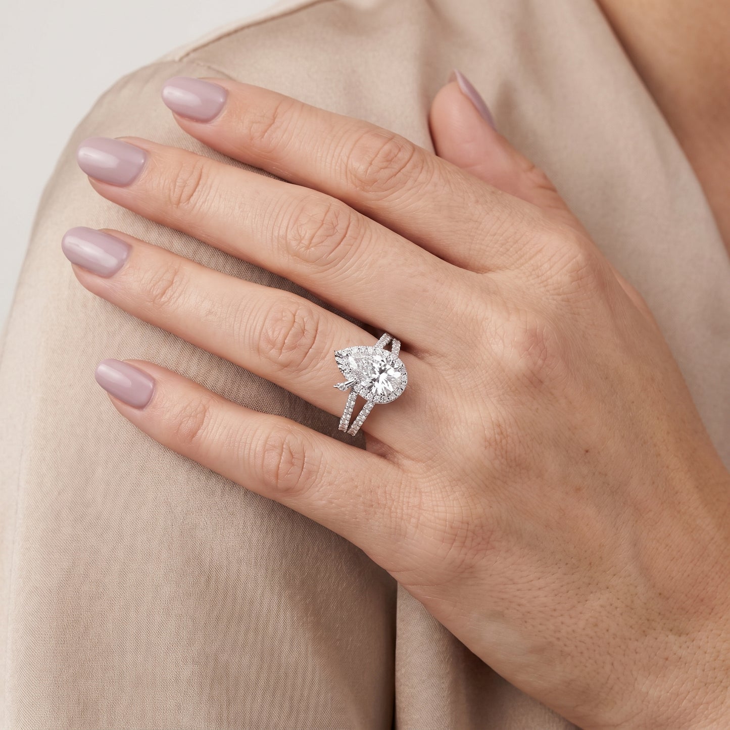Kira Halo Split Shank Pear Diamond Engagement Ring in Silver - model.jpg
