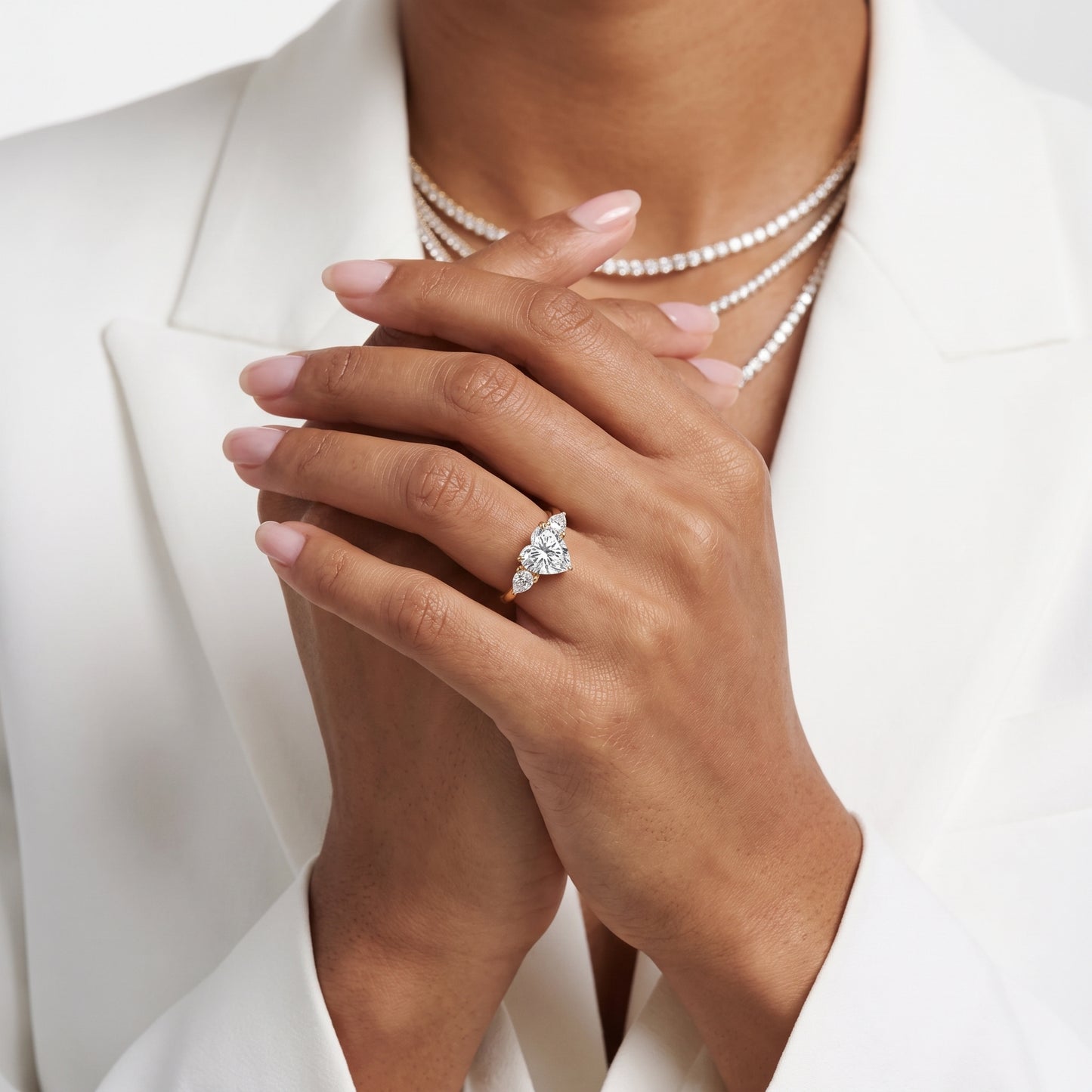 Phoebe Three-Stone Heart Diamond Ring in Yellow Gold - model.jpg