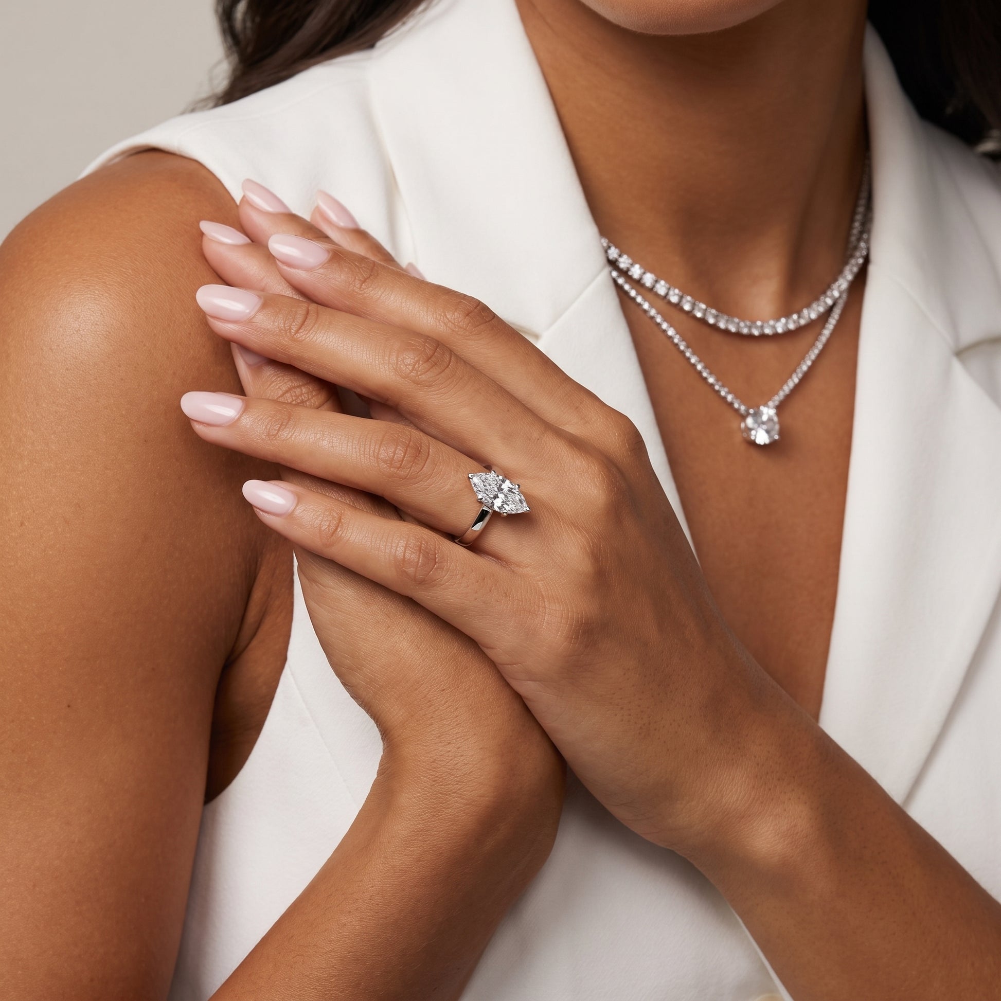 Delia Solitaire Marquise Diamond Engagement Ring in Silver - model.jpg