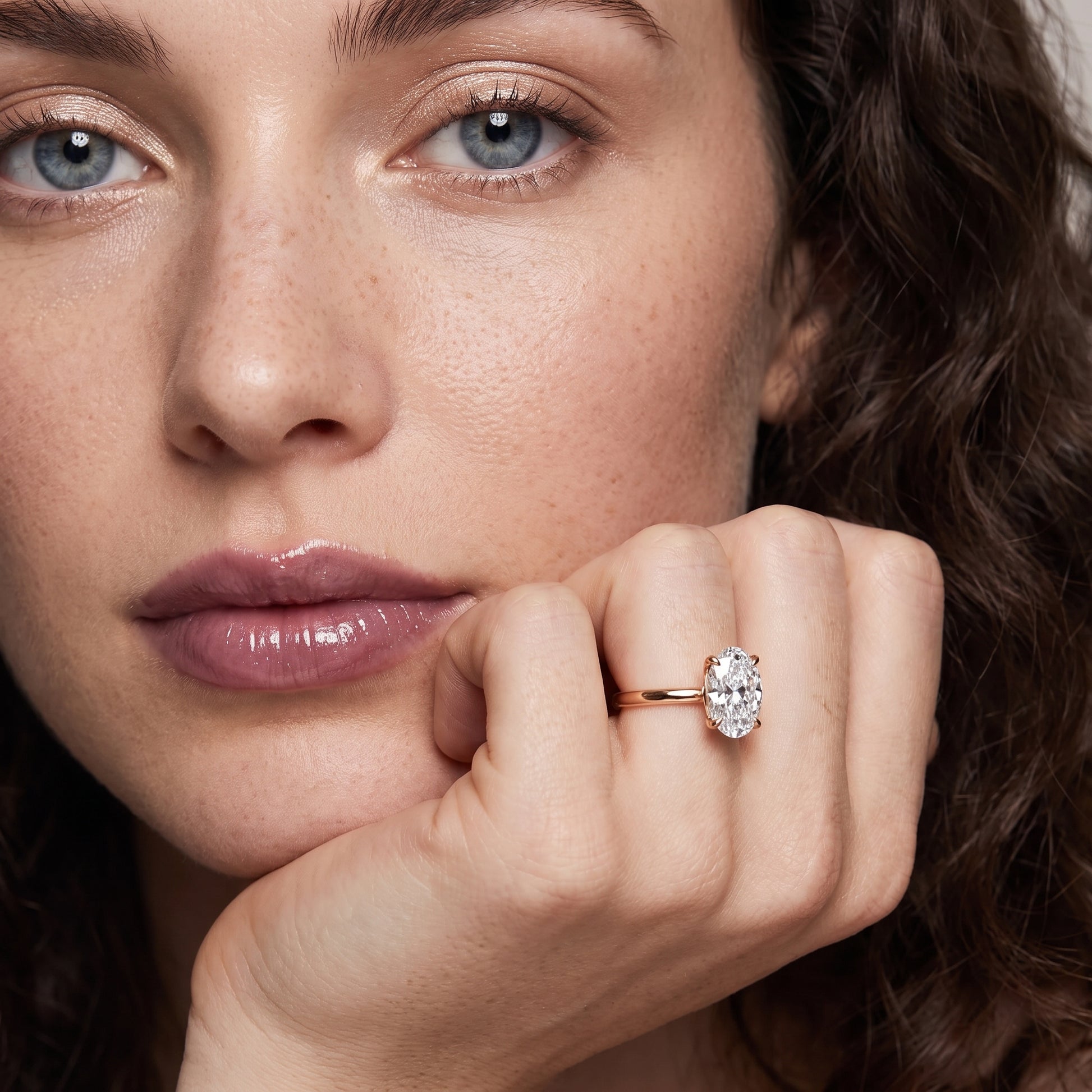 Lyla Petite Solitaire Oval Diamond Engagement Ring in Rose Gold - model.jpg