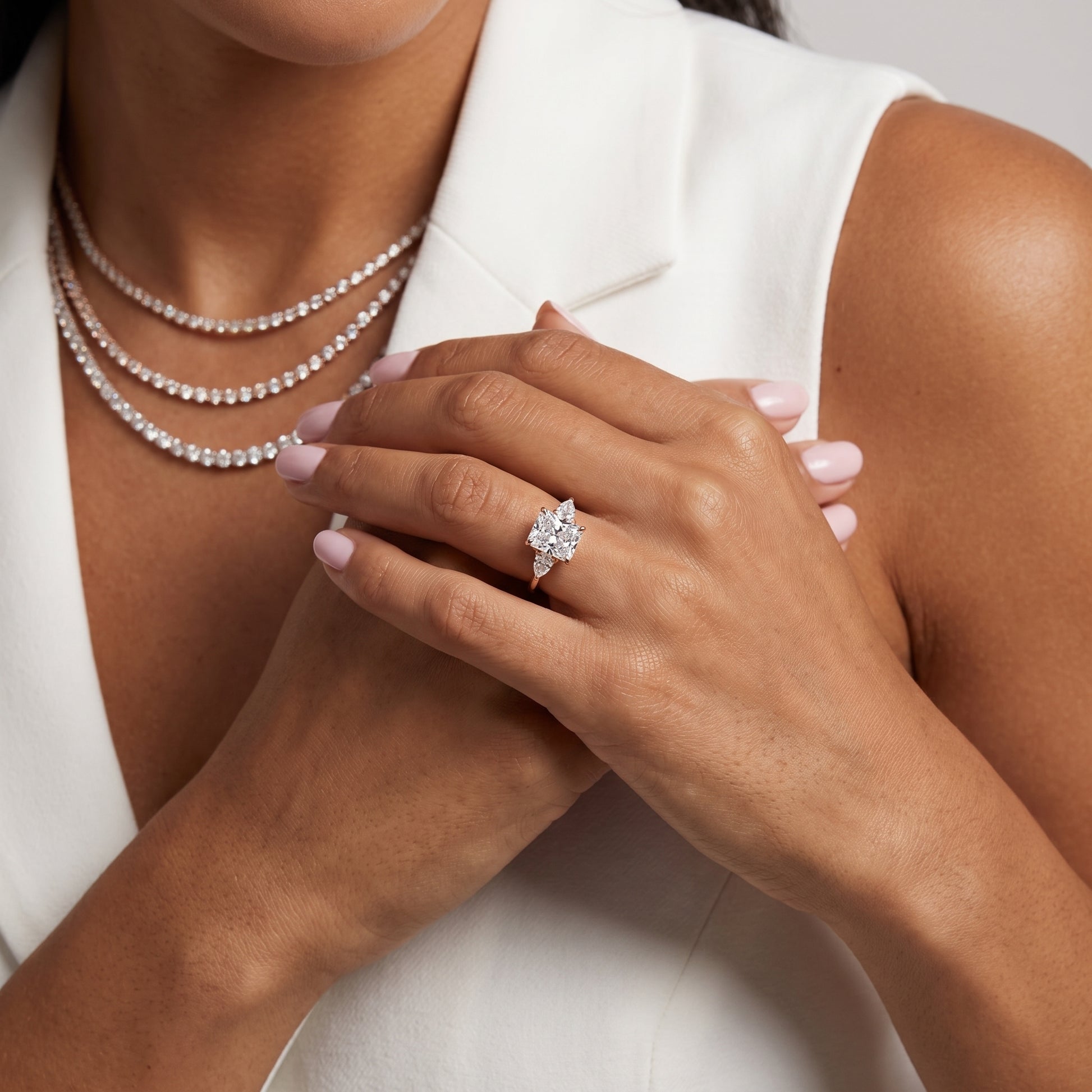 Phoebe Three-Stone Radiant Diamond Ring in Rose Gold - model.jpg