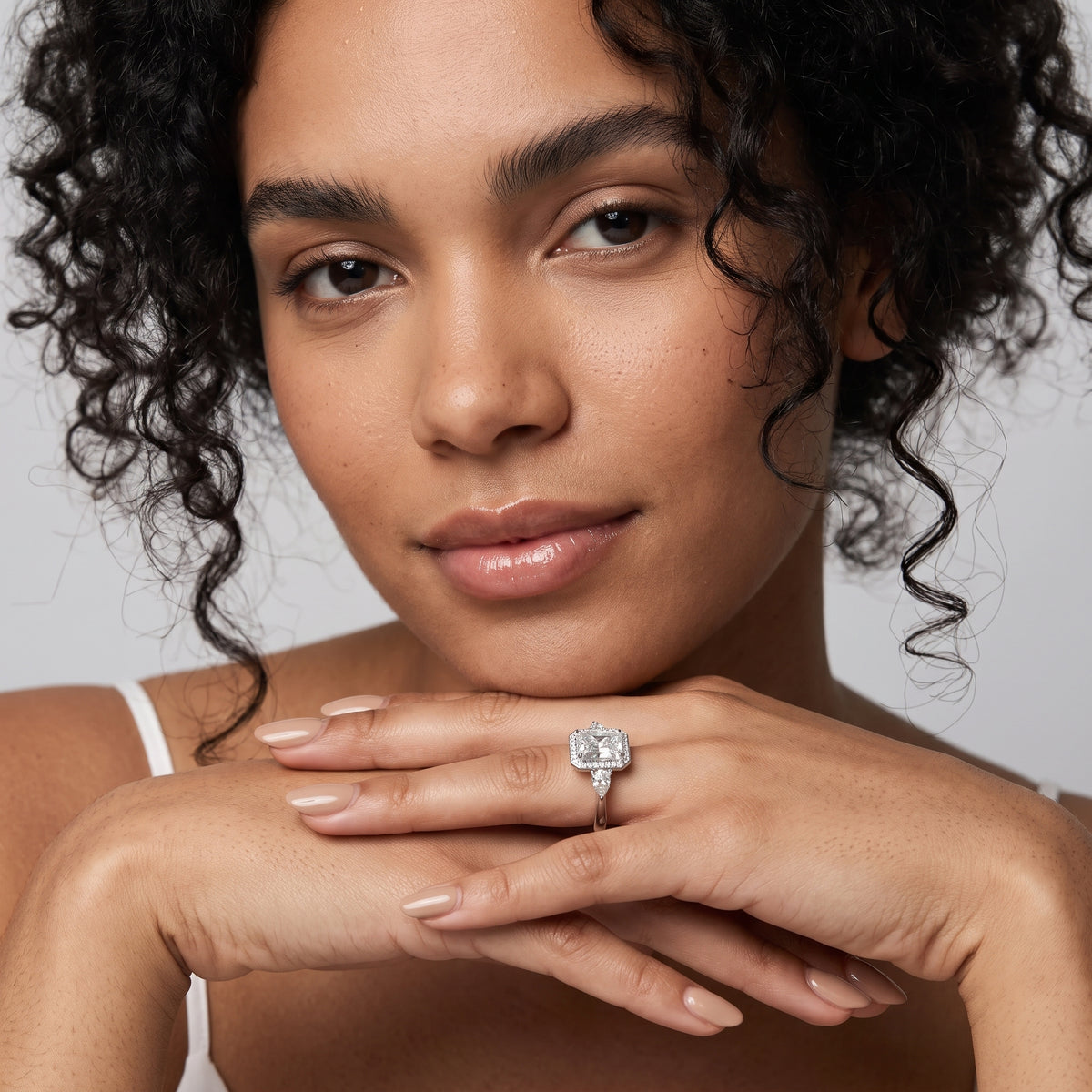 Eliza Halo Sidestone Radiant Diamond Engagement Ring in Platinum - model.jpg