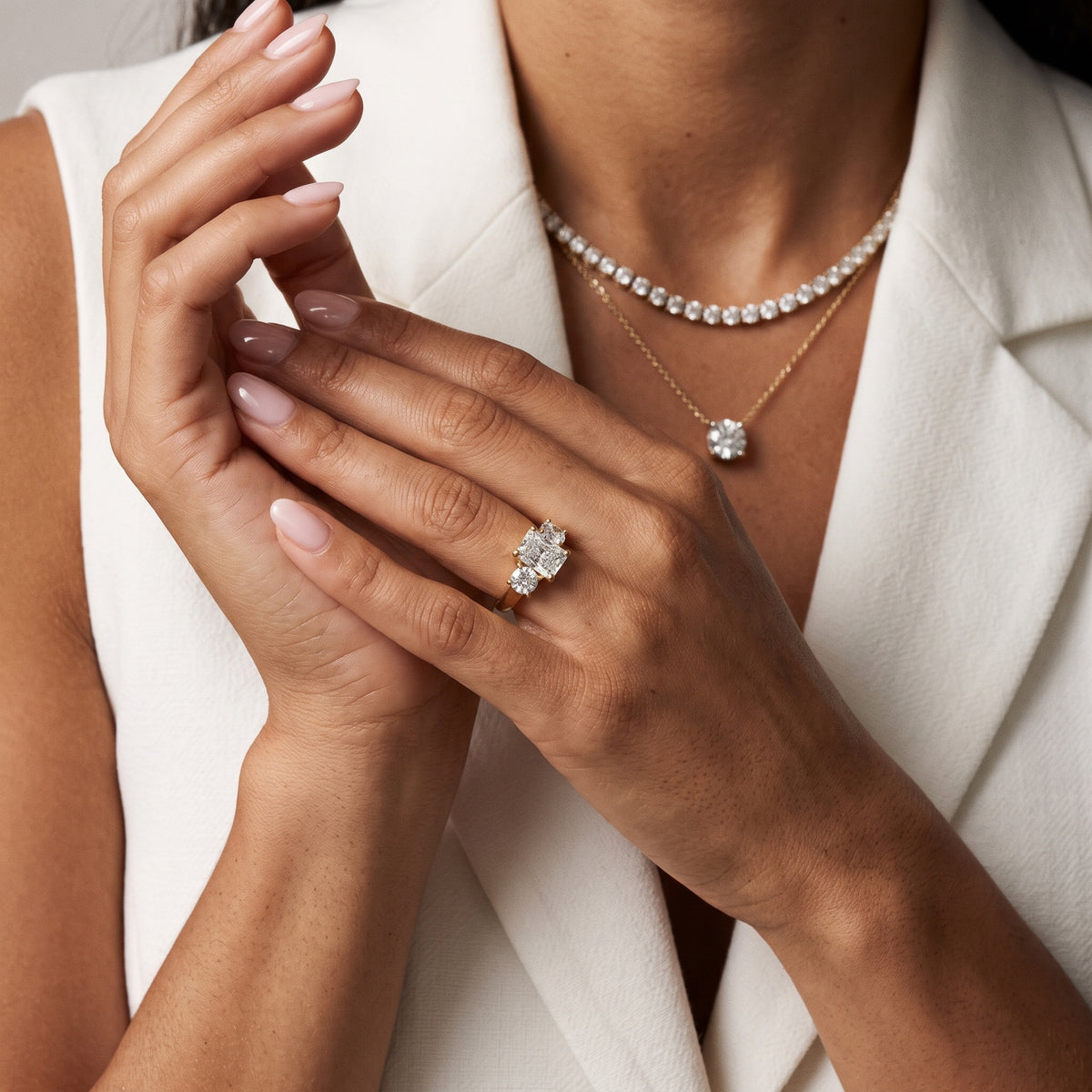 Callie Three-Stone Trellis Radiant Diamond Engagement Ring in Yellow Gold - model.jpg