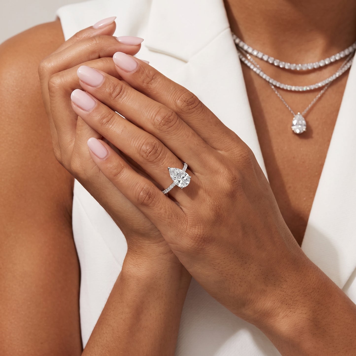 Maya Hidden Halo Pavé Pear Diamond Engagement Ring in Platinum - model.jpg