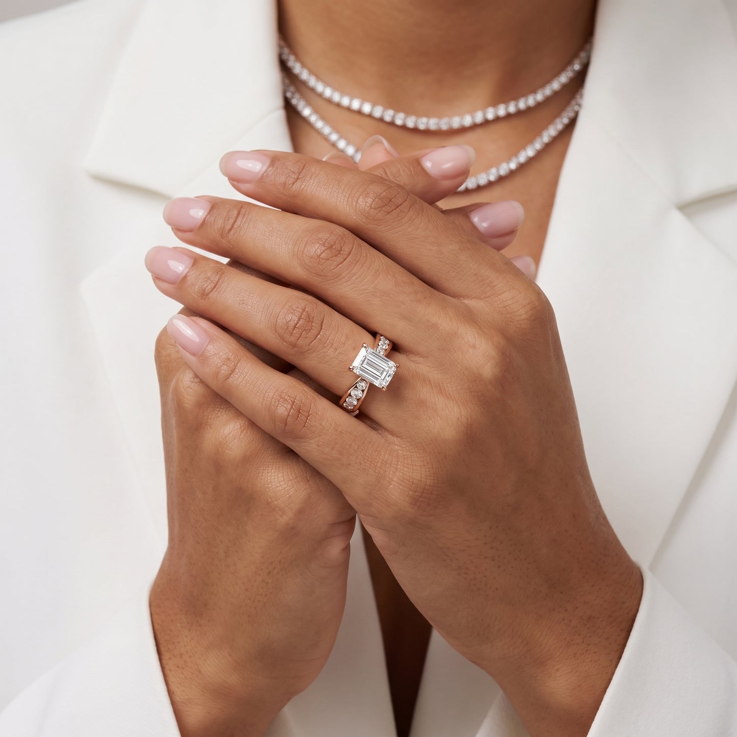 Noor Channel Set Sidestone Emerald Diamond Engagement Ring in Rose Gold - model.jpg