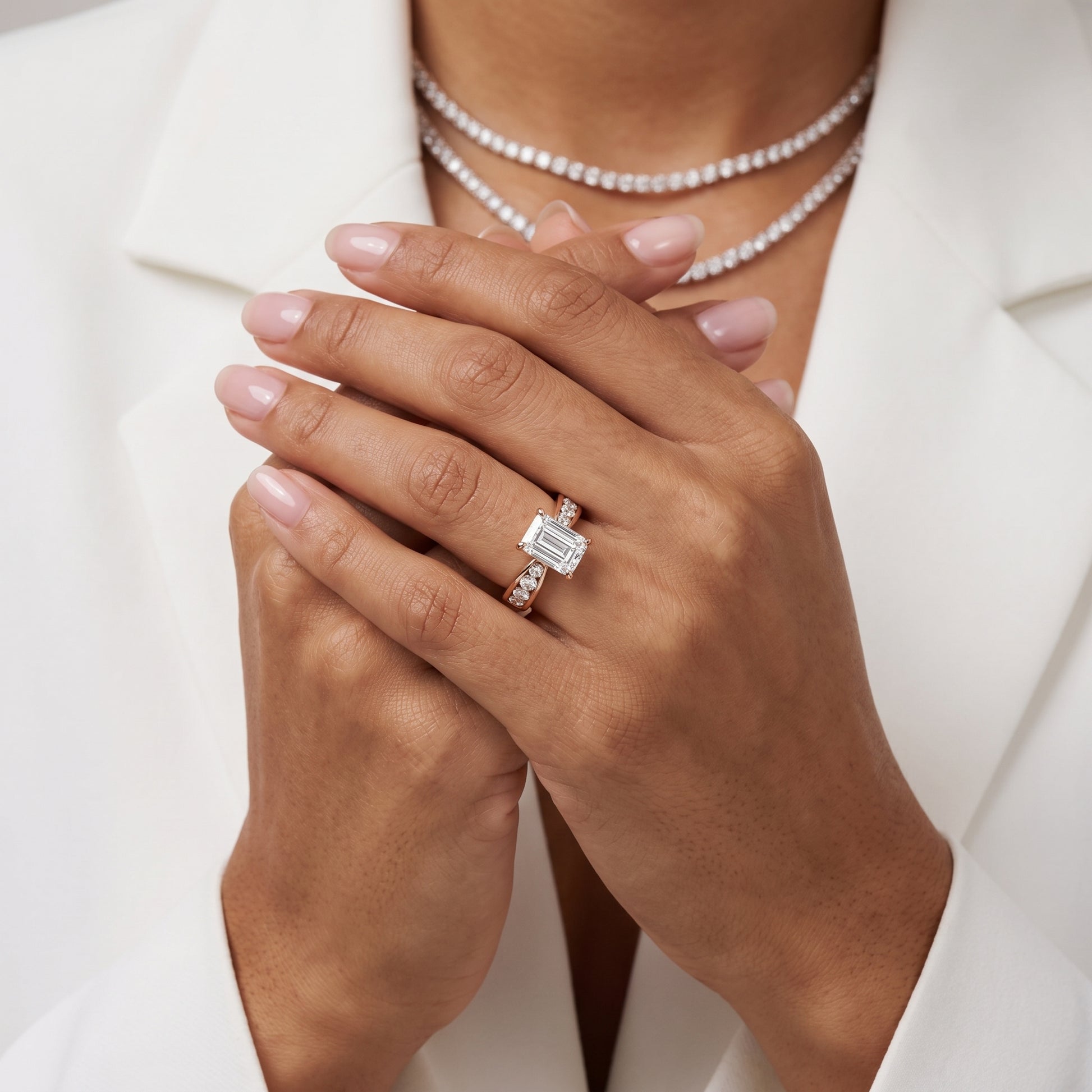Noor Channel Set Sidestone Emerald Diamond Engagement Ring in Rose Gold - model.jpg