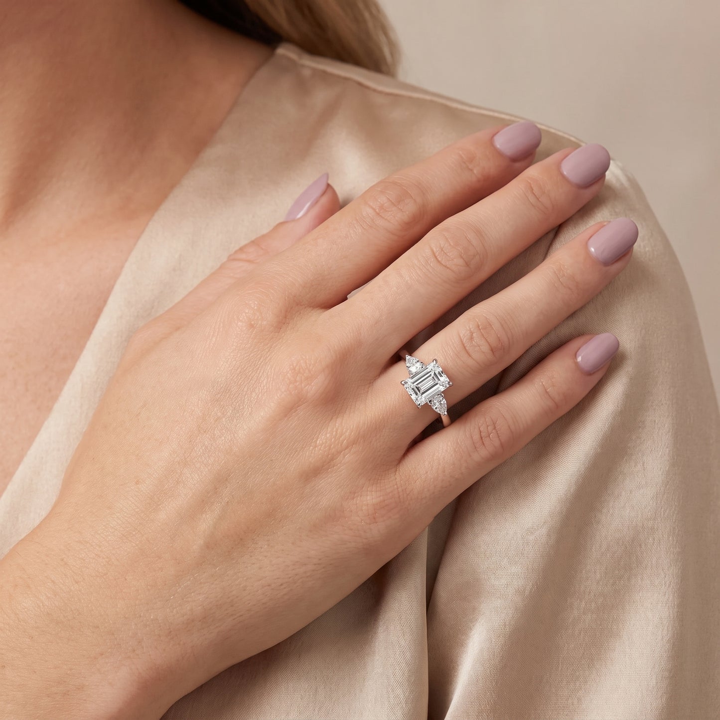 Leila Three-Stone Emerald Diamond Engagement Ring in Silver - model.jpg
