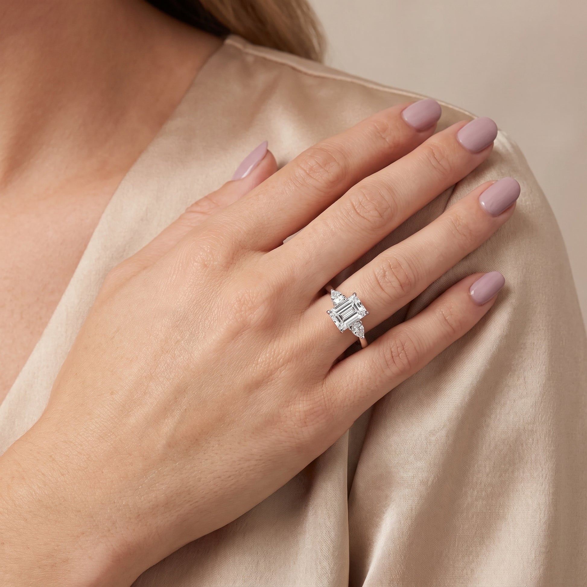 Leila Three-Stone Emerald Diamond Engagement Ring in Silver - model.jpg