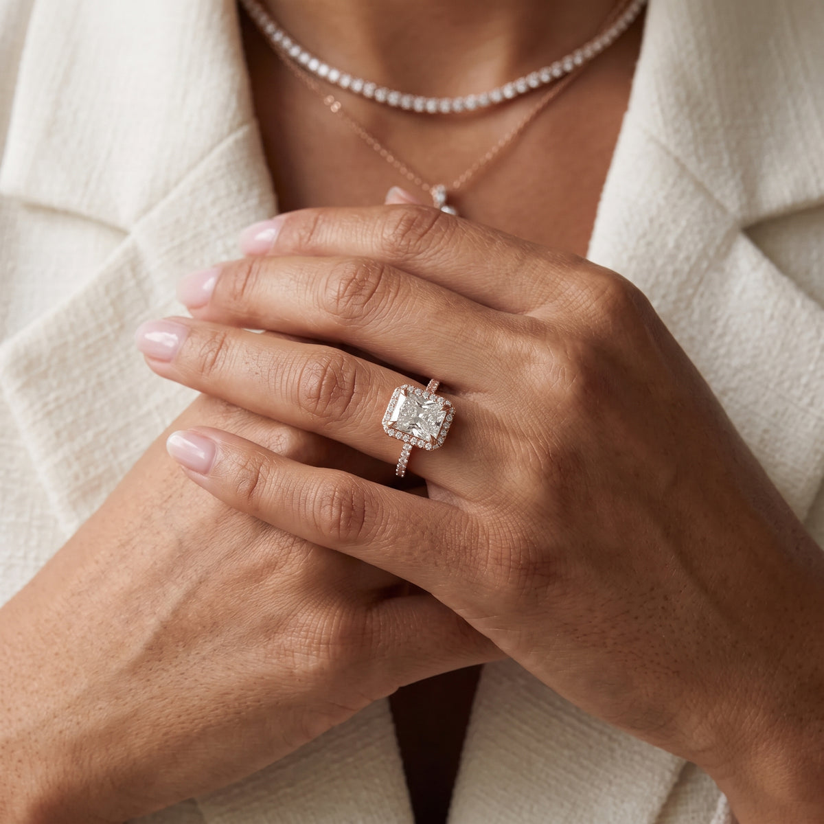Amara Halo Claw Prong Radiant Diamond Engagement Ring in Rose Gold - model.jpg
