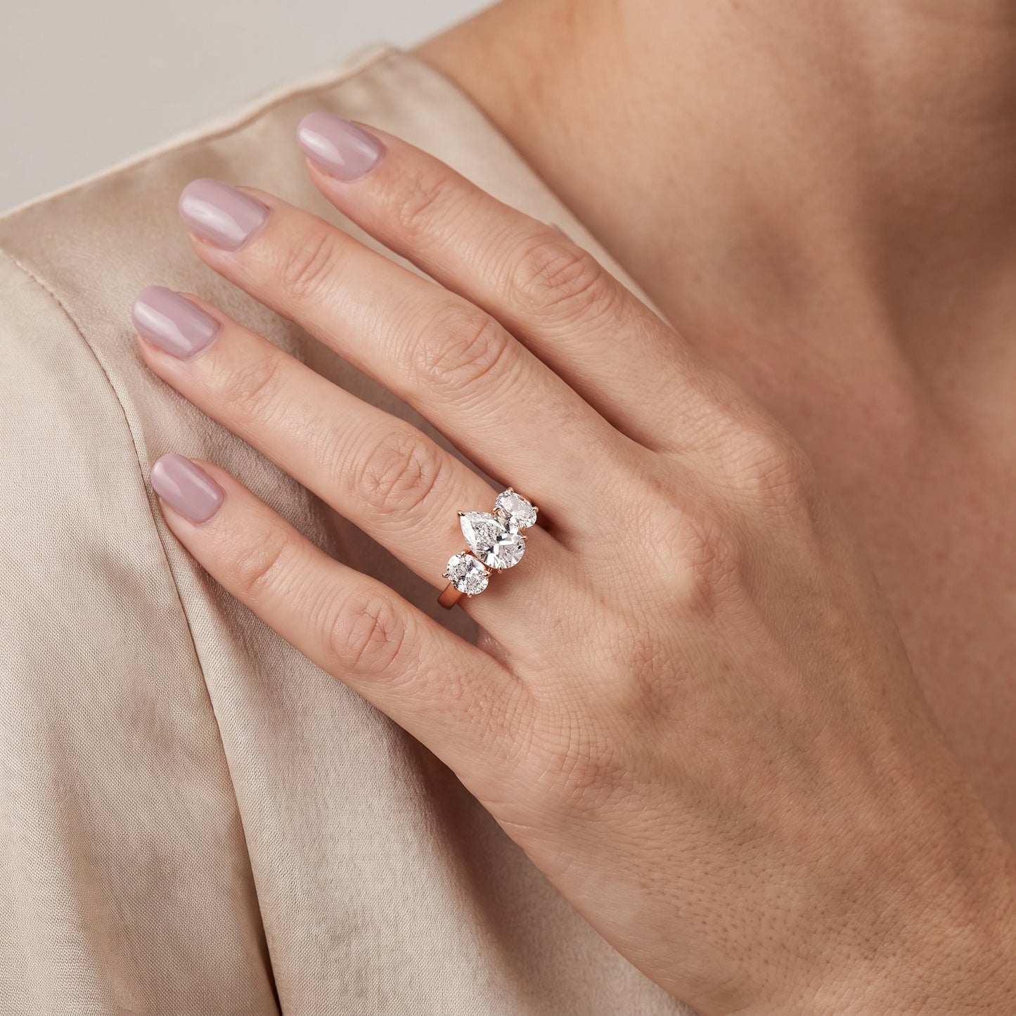 Esme Three-Stone Tapered Pear Diamond Ring in Rose Gold - model.jpg