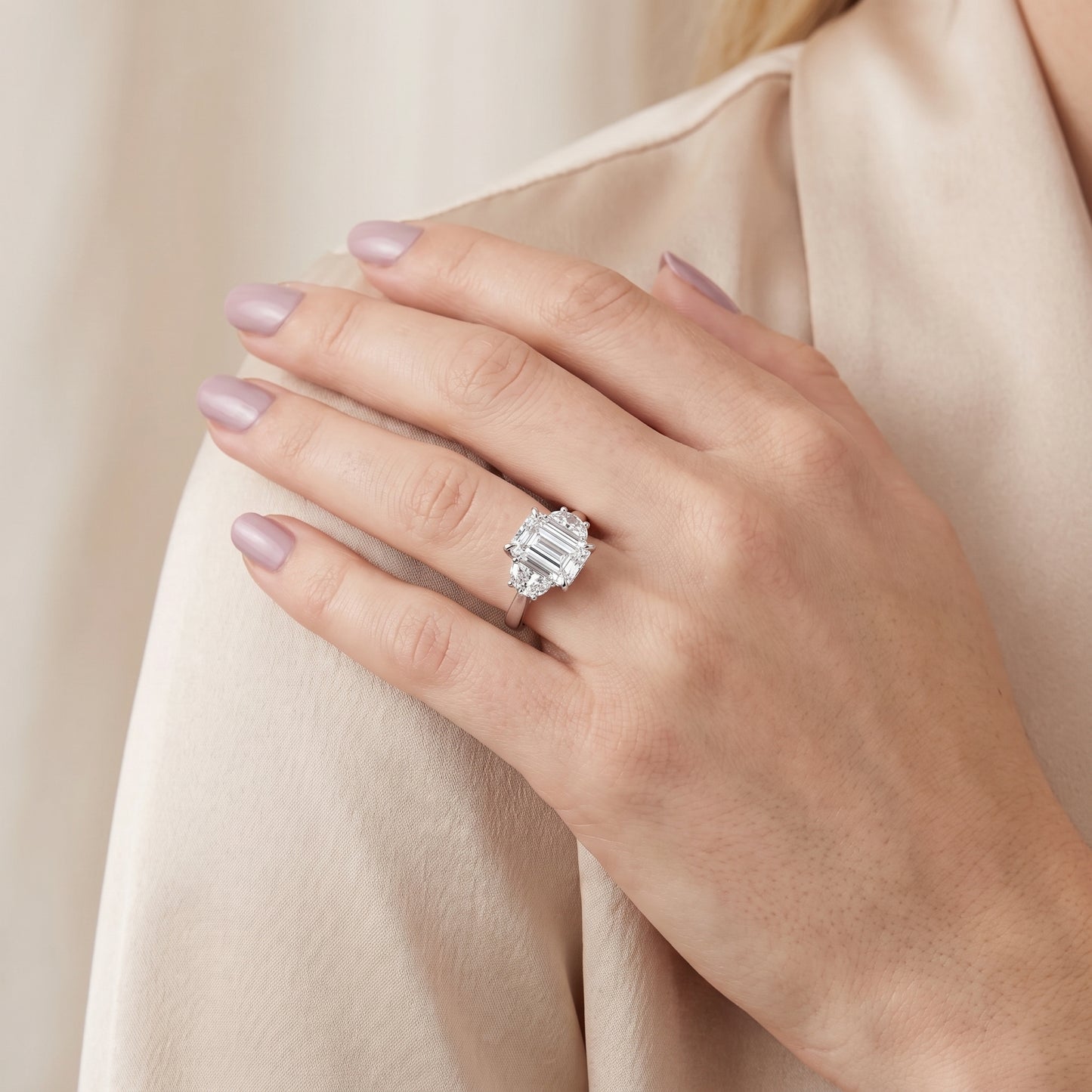 Romy Three-Stone Emerald Diamond Engagement Ring in Platinum - model.jpg