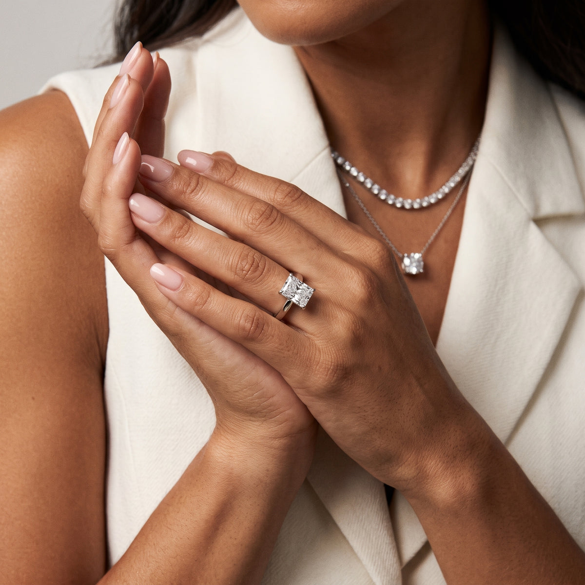 Delia Solitaire Radiant Diamond Engagement Ring in Platinum - model.jpg