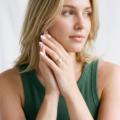 Neva Infinity Twist Emerald Diamond Engagement Ring in Rose Gold - model.jpg