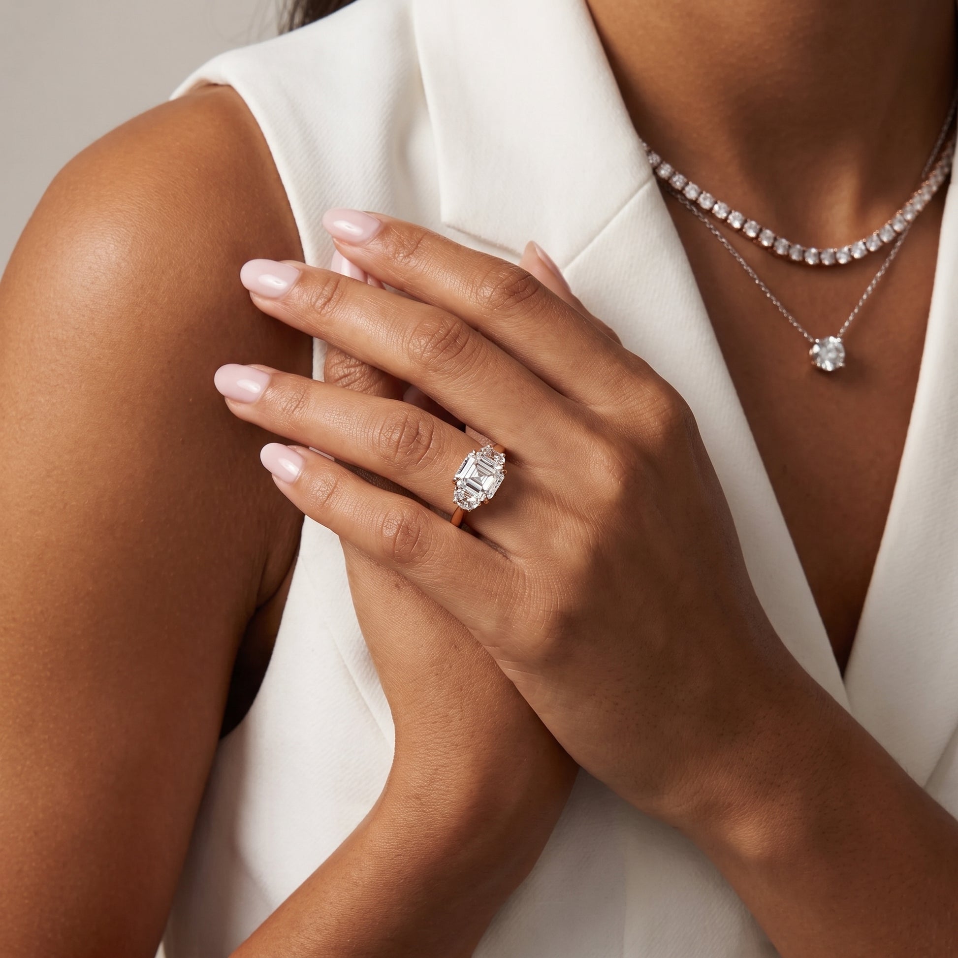 Romy Three-Stone Asscher Diamond Engagement Ring in Rose Gold - model.jpg