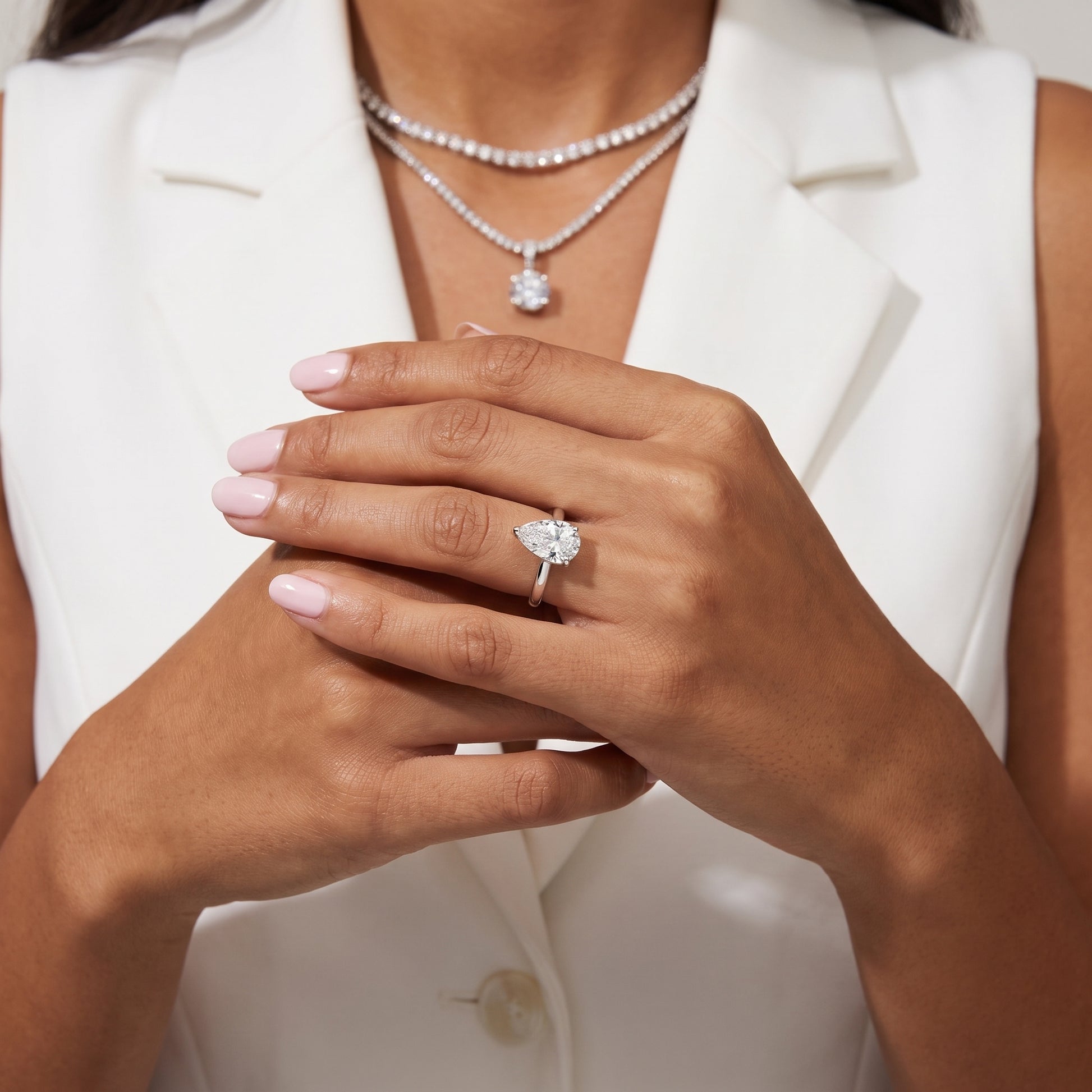Sadie Cathedral Solitaire Pear Diamond Ring in Platinum - model.jpg