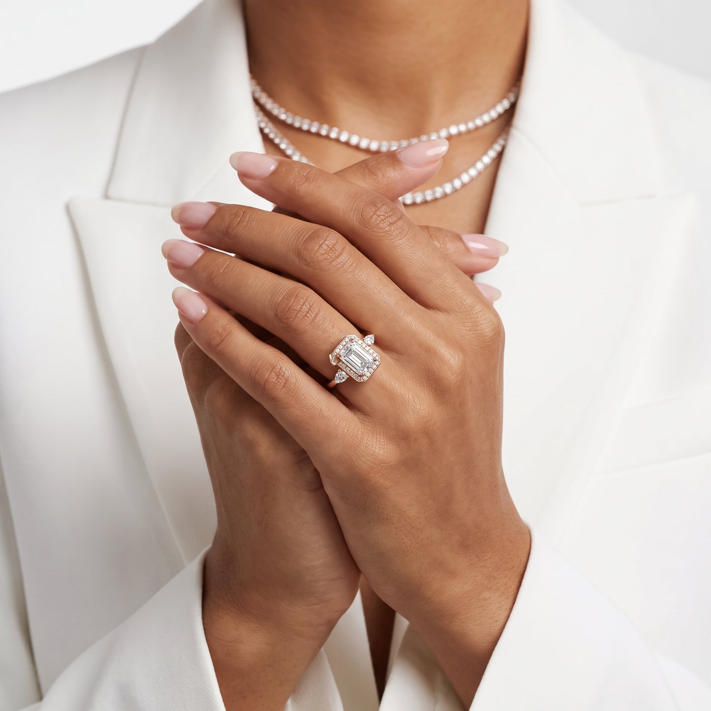 Eliza Halo Sidestone Emerald Diamond Engagement Ring in Rose Gold - model.jpg