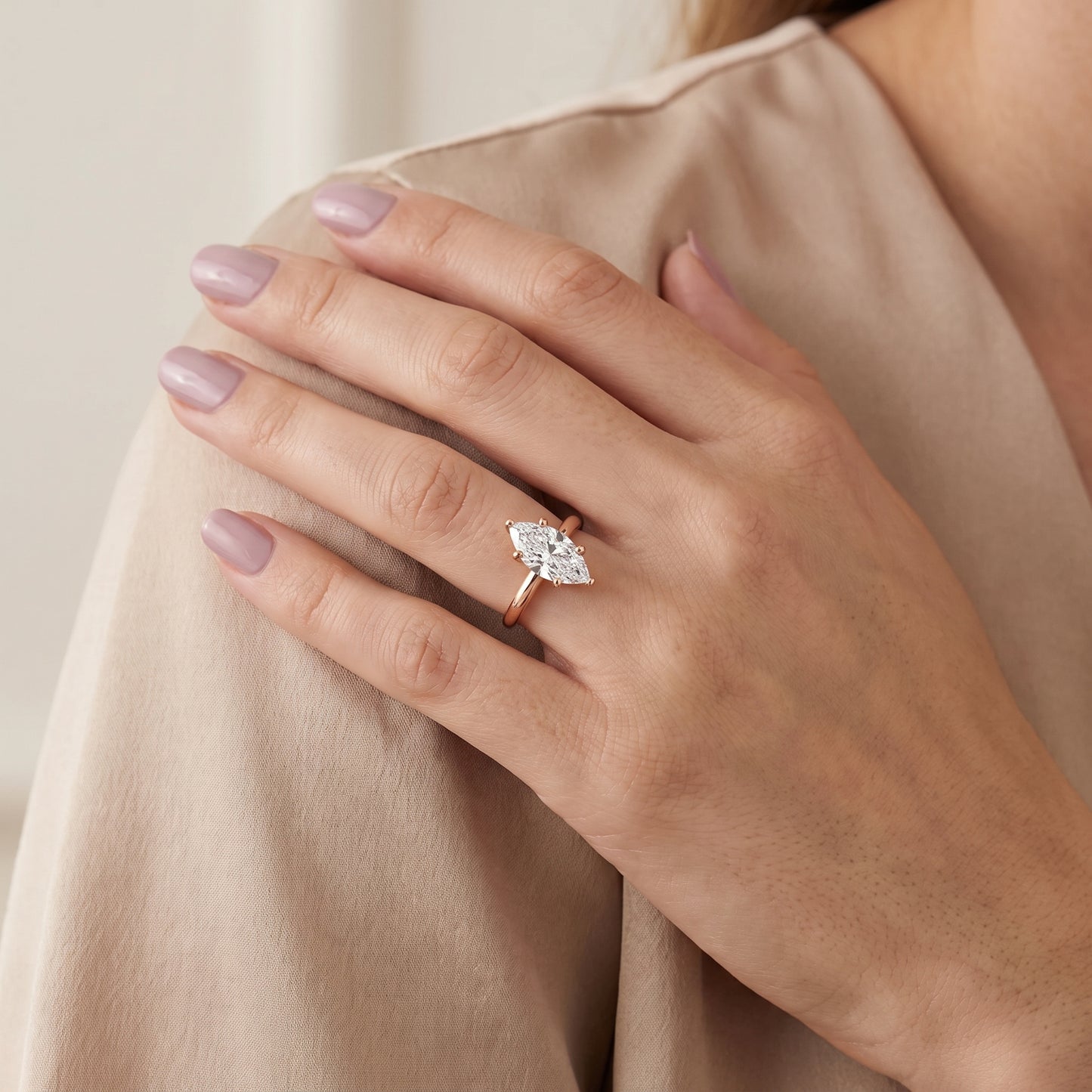Wren Solitaire Marquise Diamond Ring in Rose Gold - model.jpg