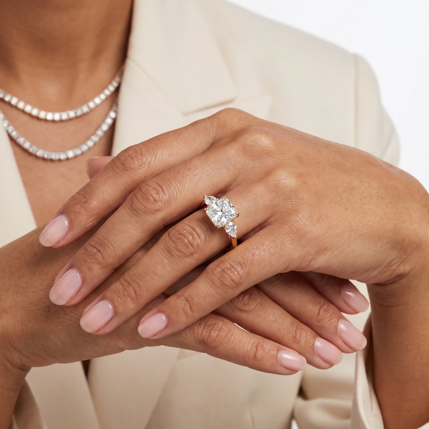 Phoebe Three-Stone Radiant Diamond Ring in Yellow Gold - model.jpg