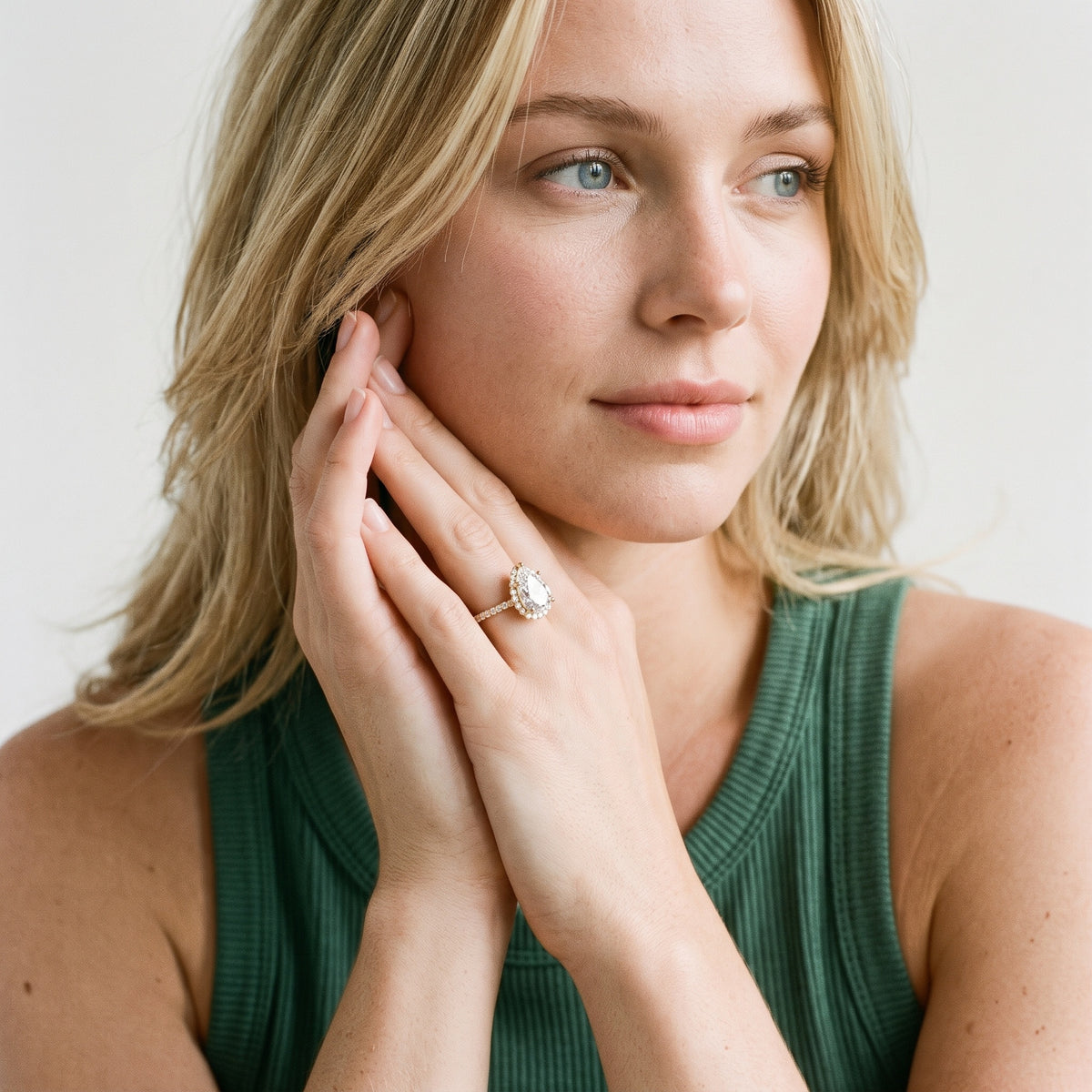 Leonie Starburst Halo Pear Diamond Engagement Ring in Rose Gold - model.jpg