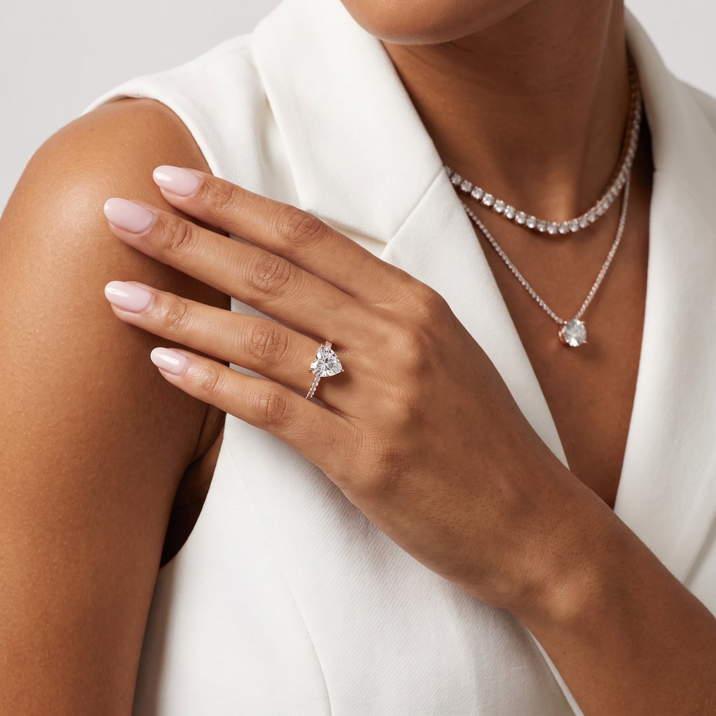 Aisha Pavé Solitaire Heart Diamond Engagement Ring in Rose Gold - model.jpg