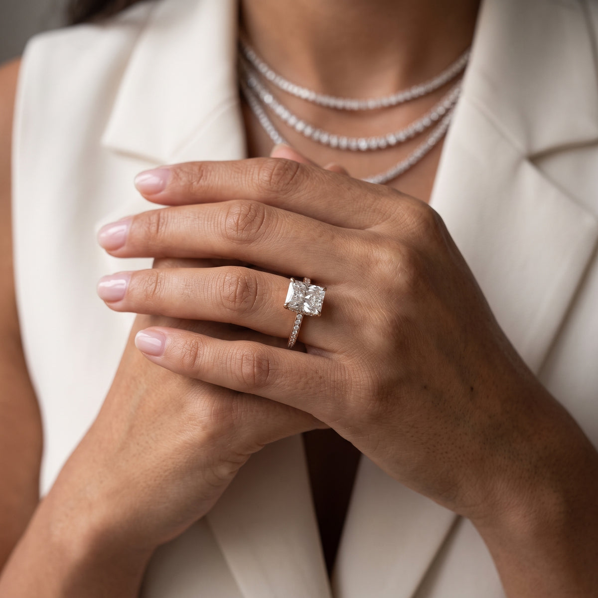 Naia Hidden Halo Radiant Diamond Engagement Ring in Rose Gold - model.jpg