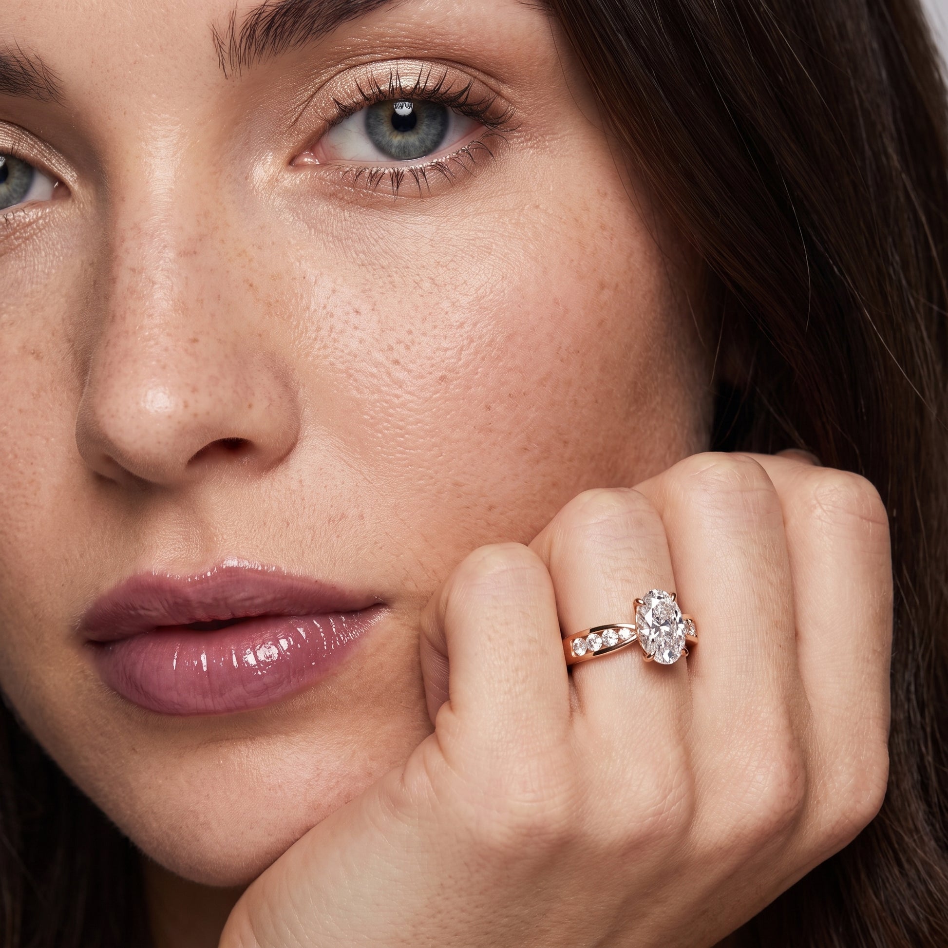 Noor Channel Set Sidestone Oval Diamond Engagement Ring in Rose Gold - model.jpg