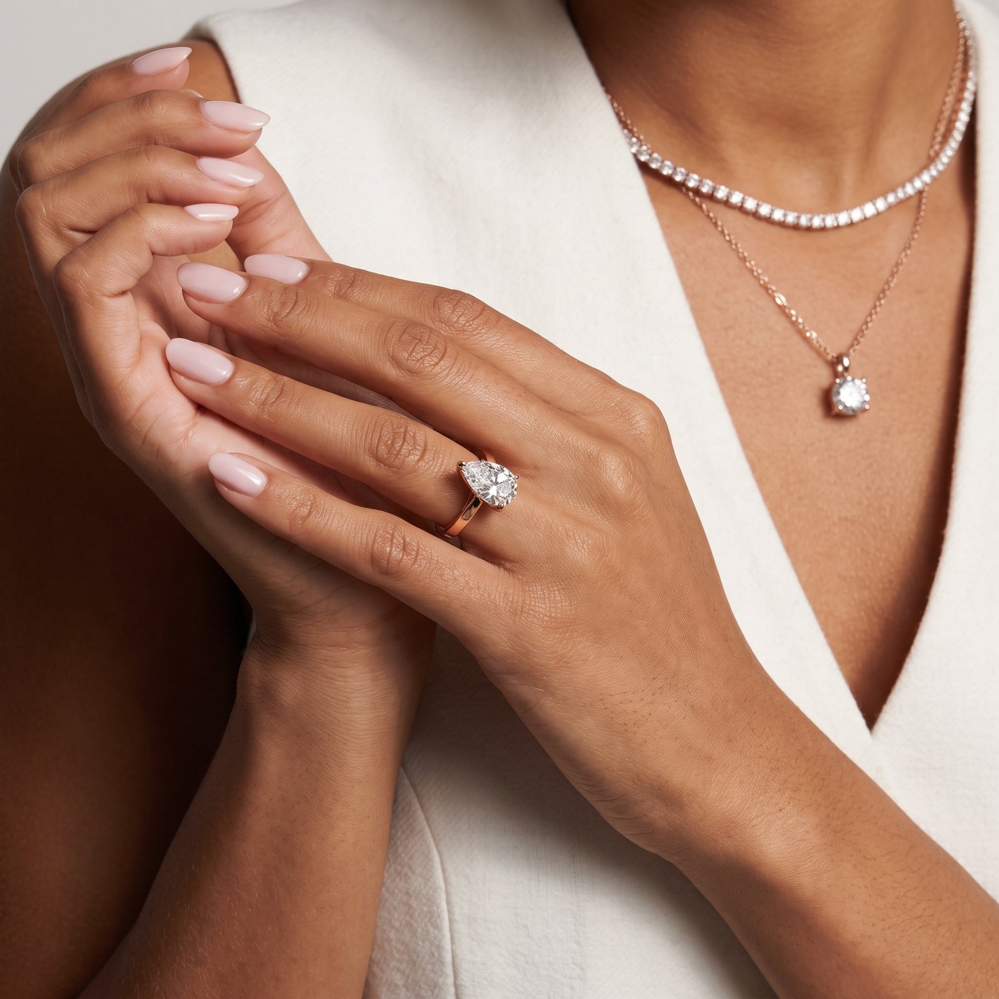Kaia Solitaire Pear Diamond Ring in Rose Gold - model.jpg