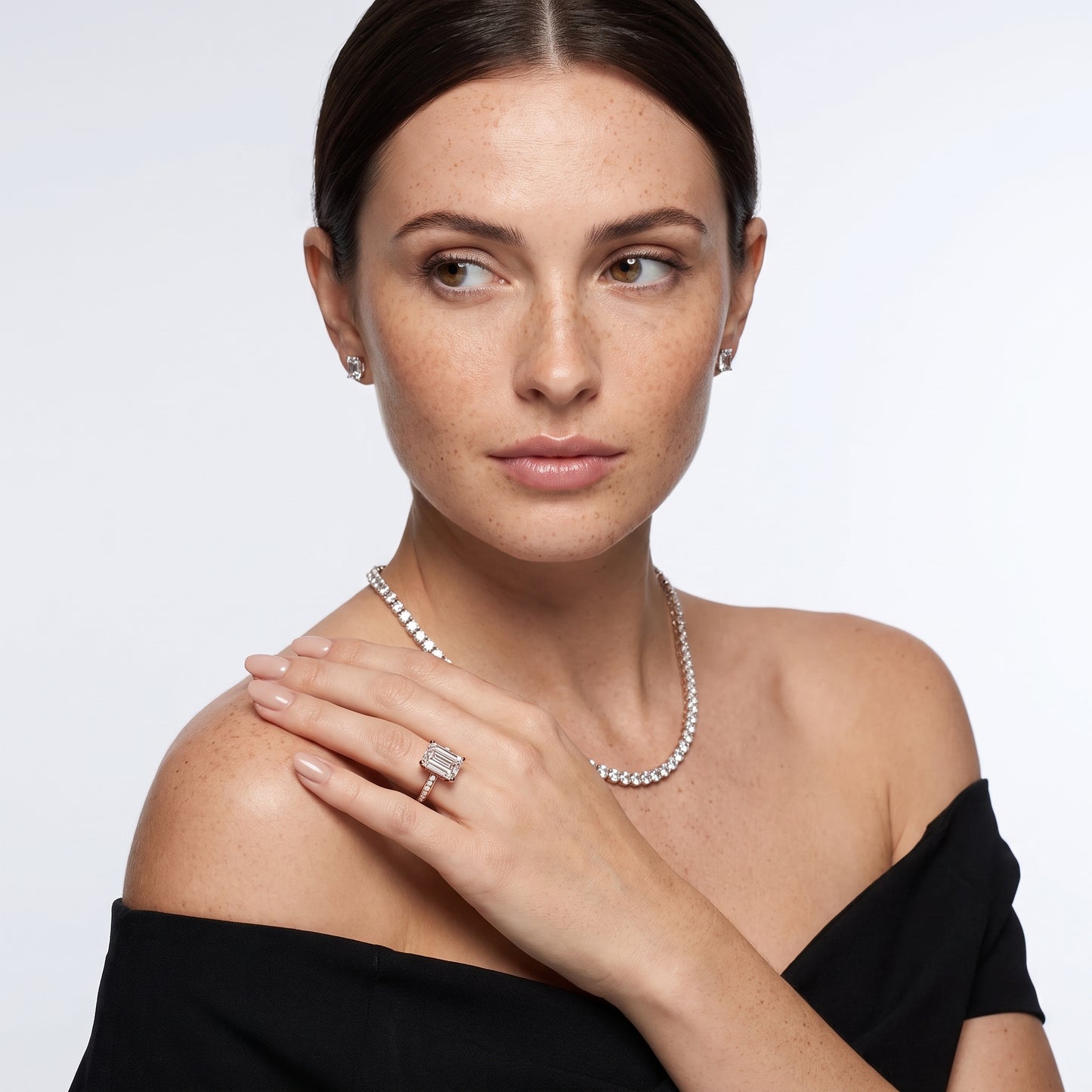 Tessa Solitaire Channel Set Emerald Diamond Engagement Ring in Rose Gold - model.jpg