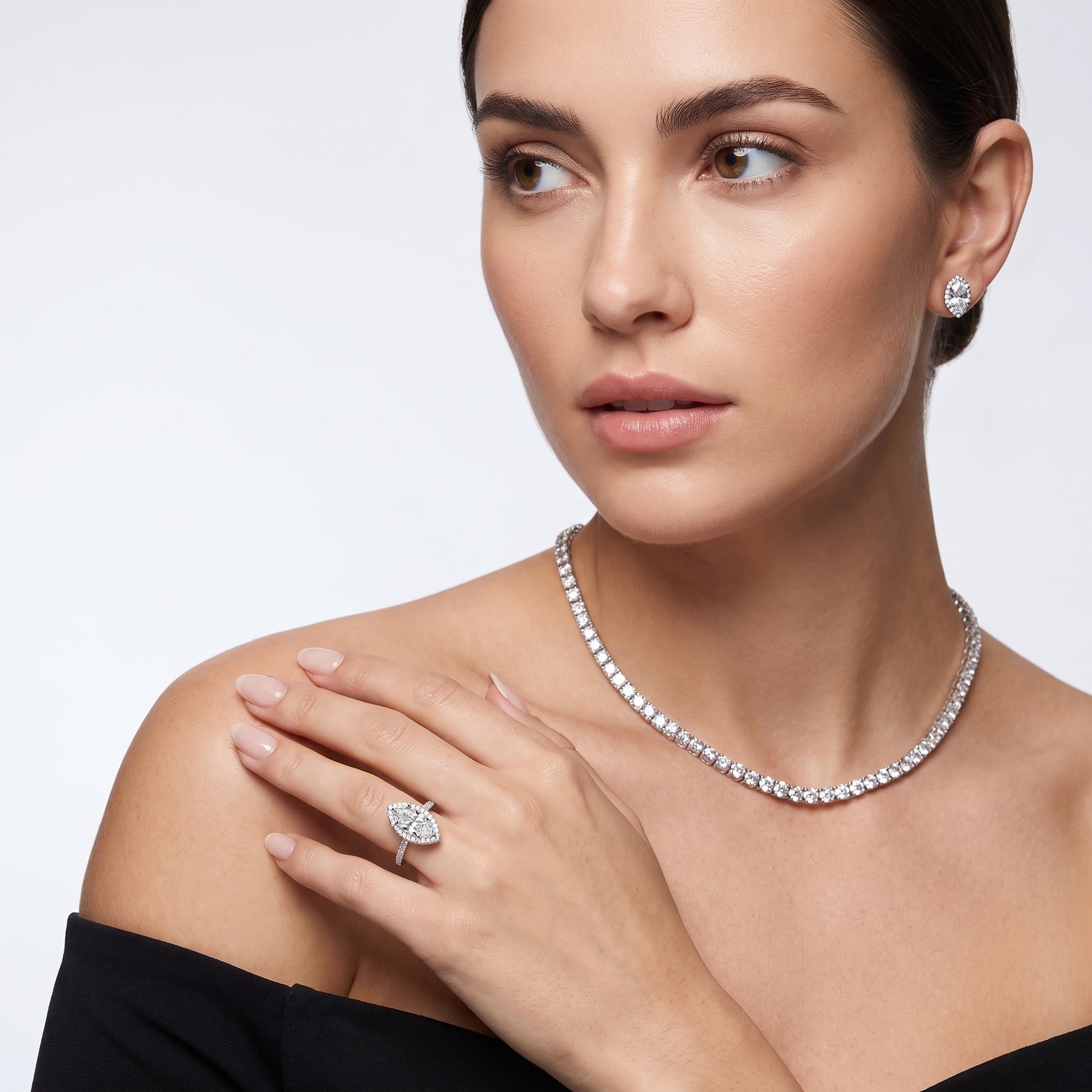Amara Halo Claw Prong Marquise Diamond Ring in Platinum - model.jpg