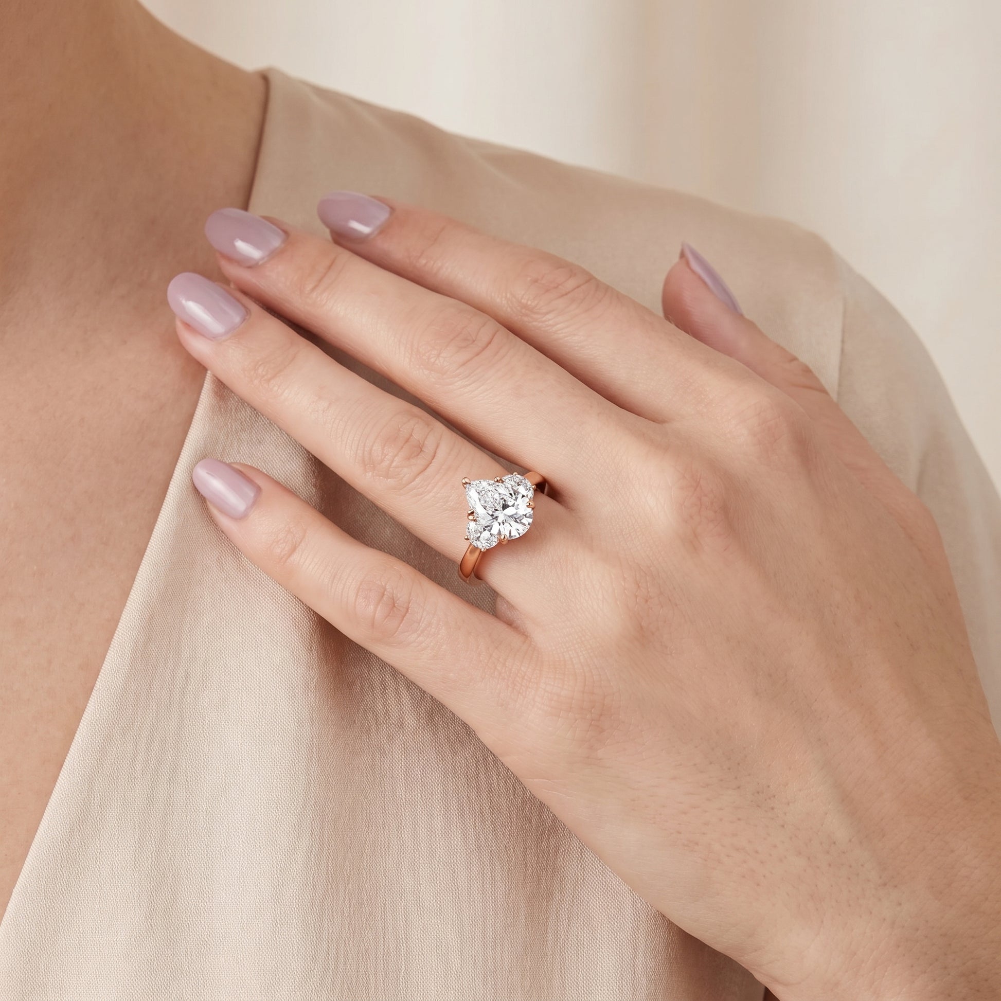 Romy Three-Stone Pear Diamond Engagement Ring in Rose Gold - model.jpg